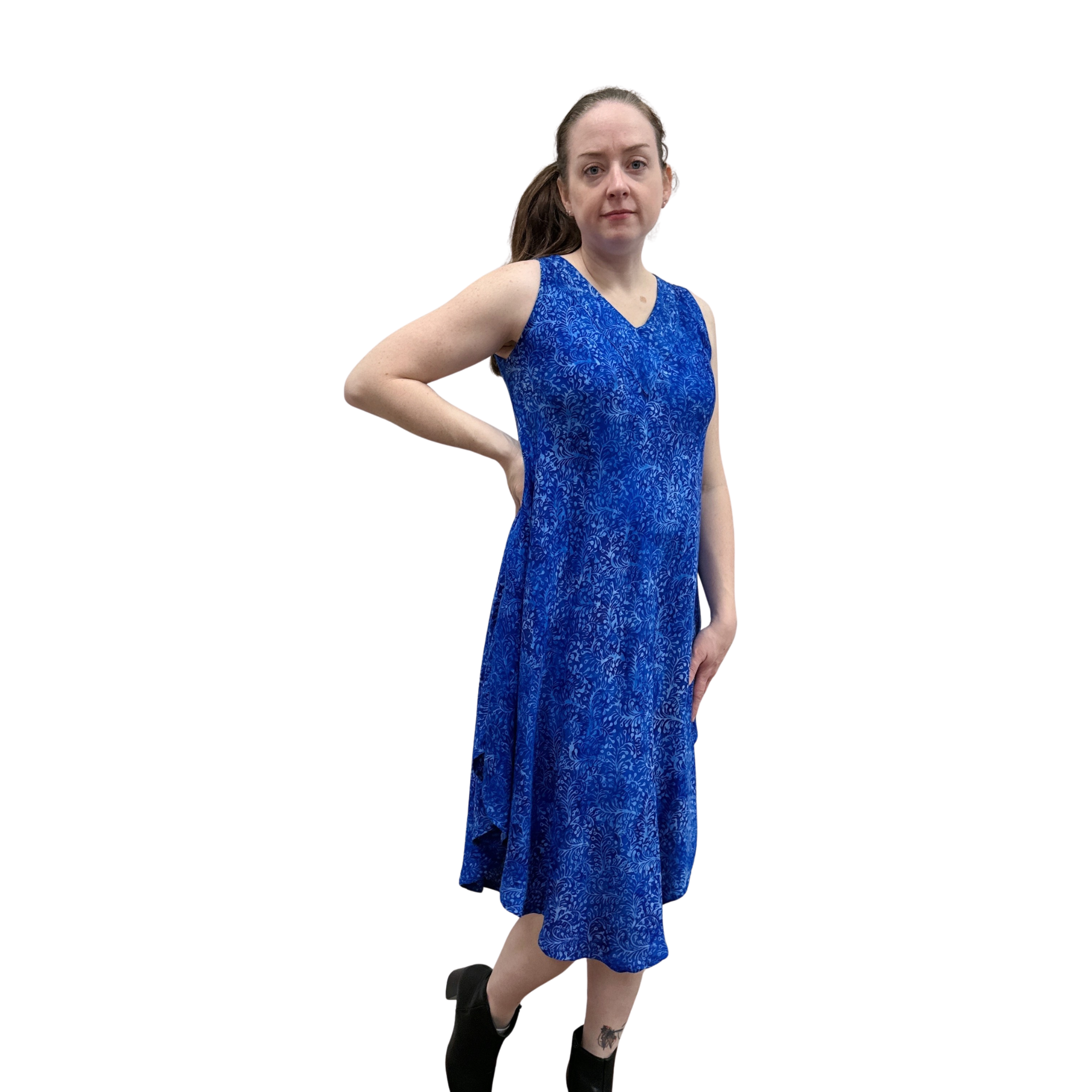Woman wearing a blue dress on a white background