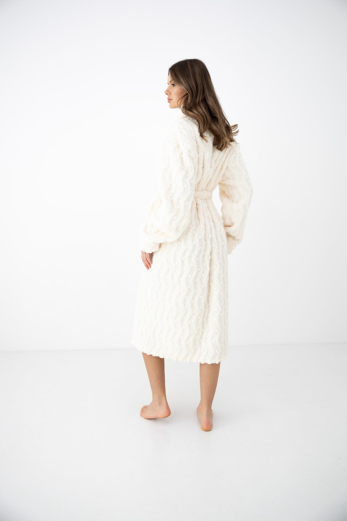 Sensis Solene Ivory robe showing raised textured fabric and long wrap design
