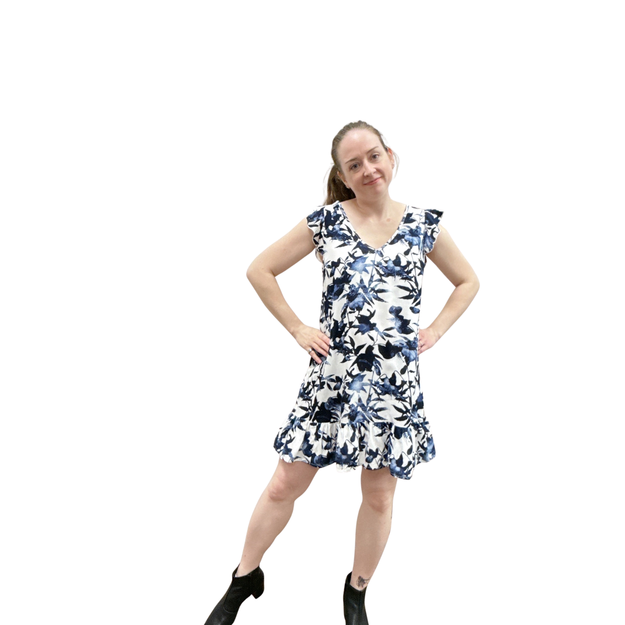 Woman wearing a floral dress on a white background