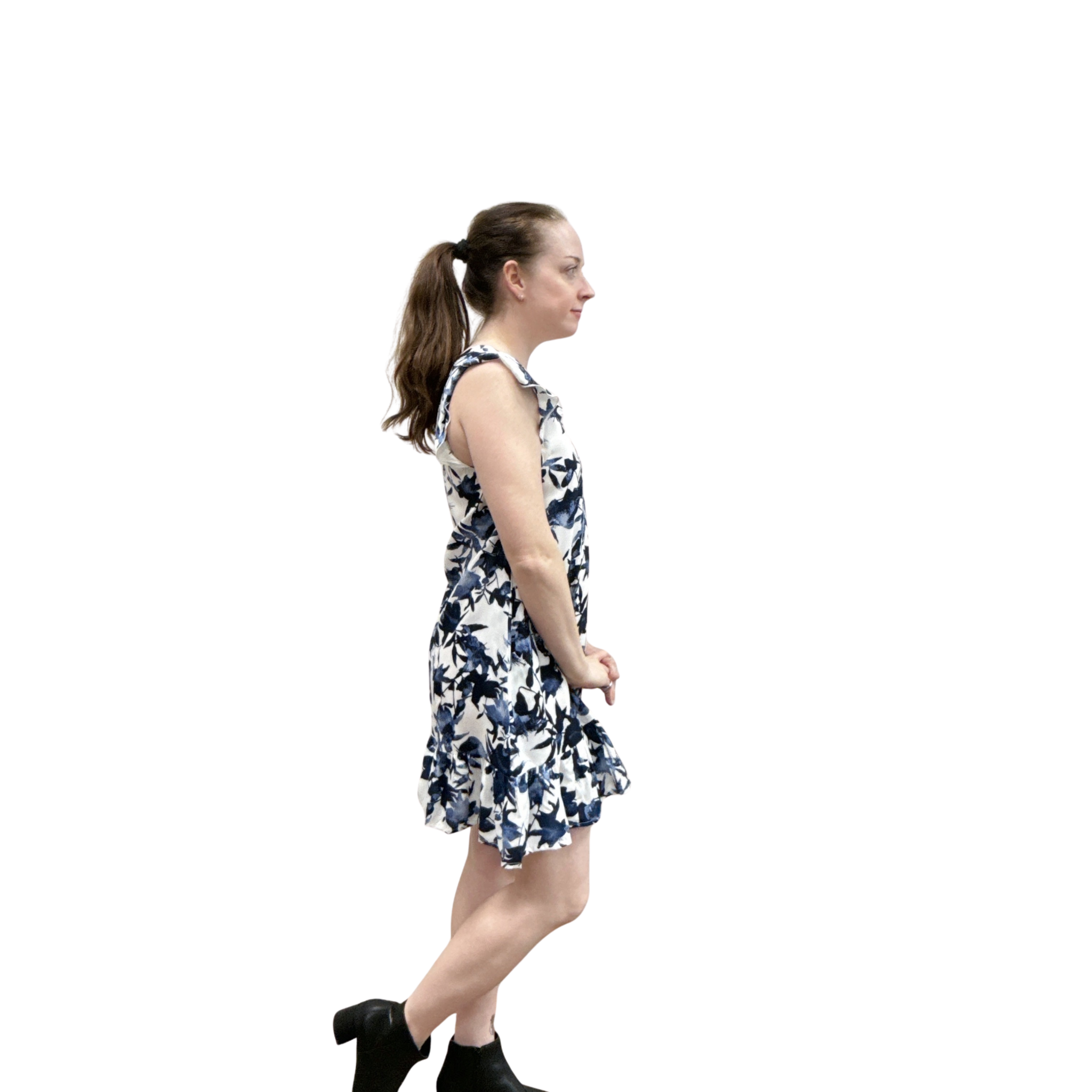Woman wearing a floral dress on a white background
