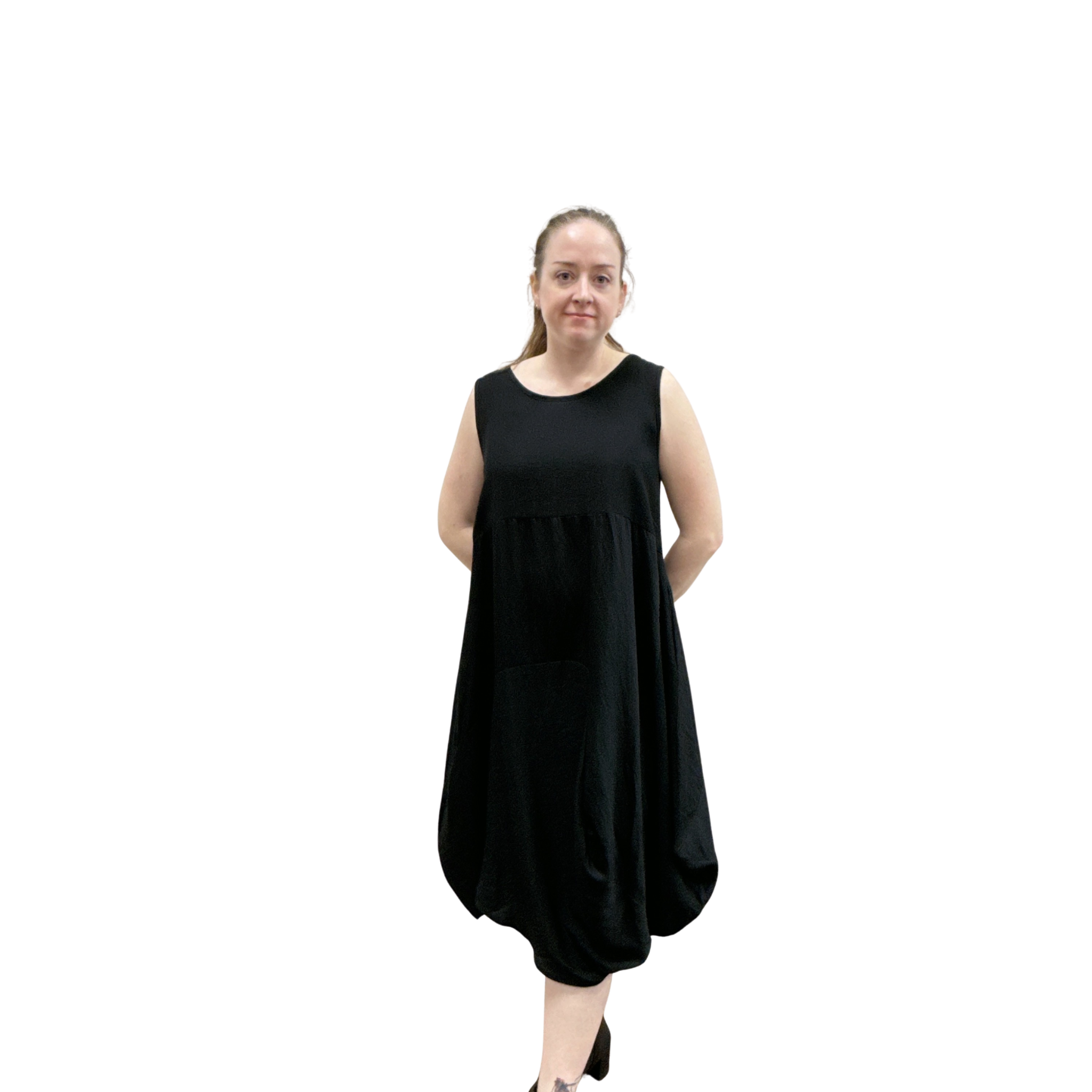 Woman wearing a black sleeveless dress on a white background
