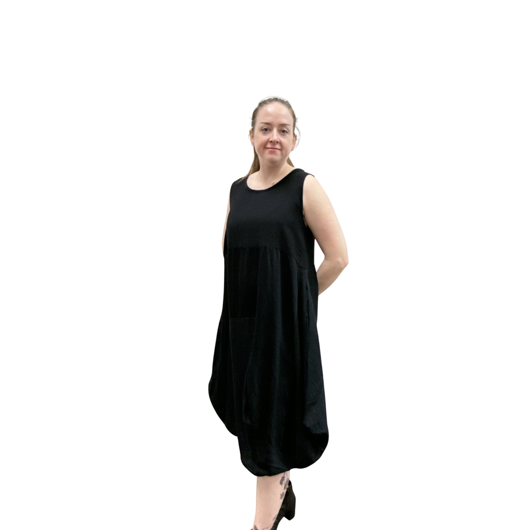 Woman wearing a black sleeveless dress on a white background