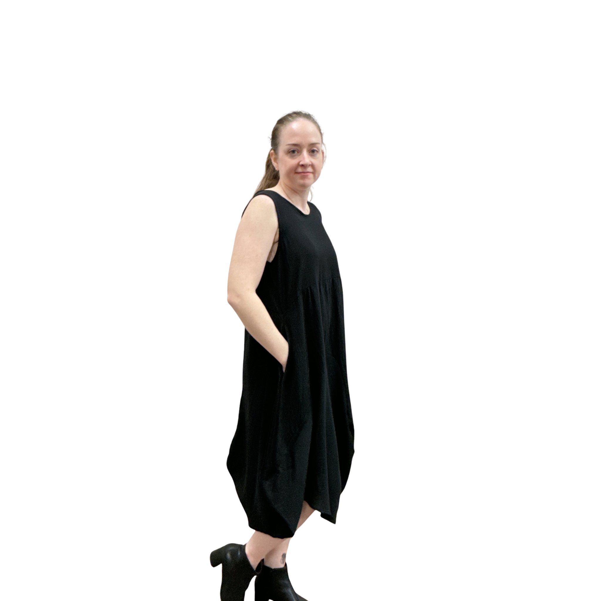Woman wearing a black sleeveless dress on a white background