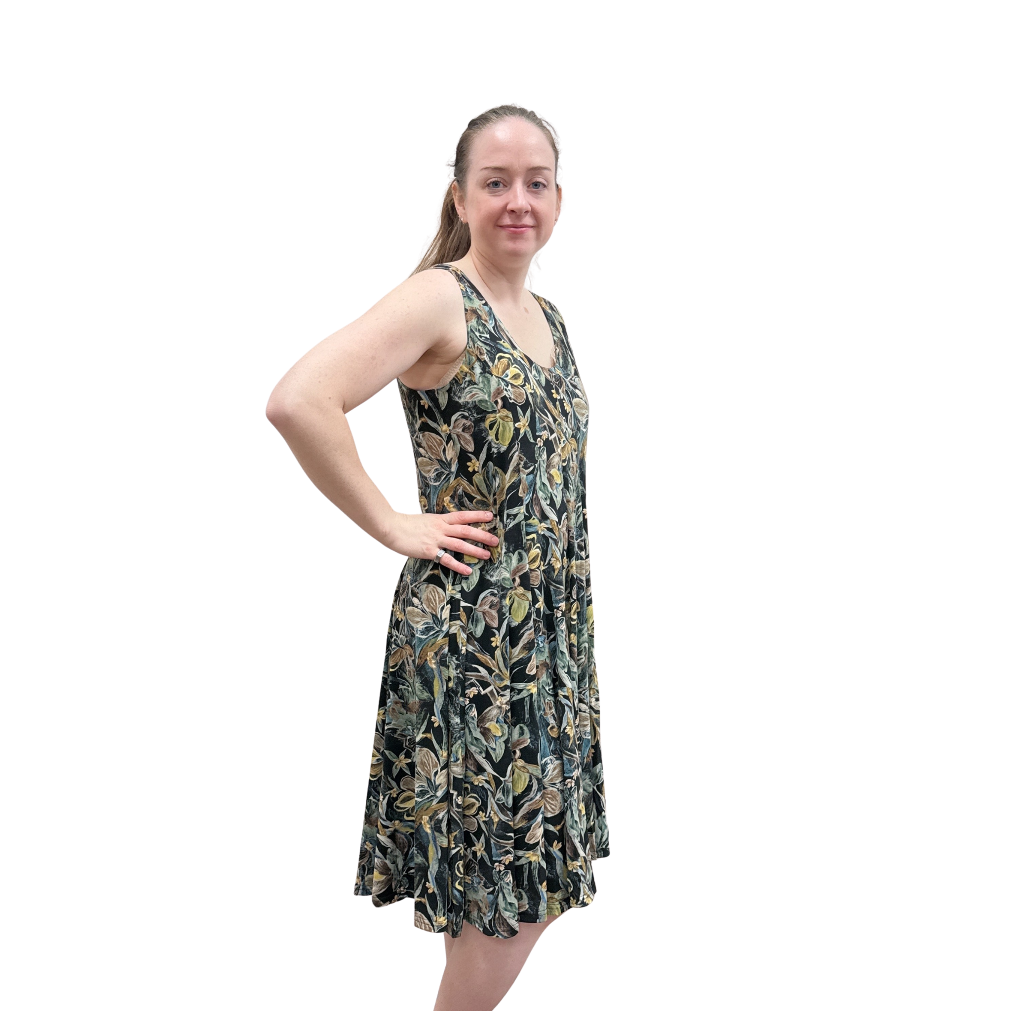 Woman wearing a floral dress on a white background