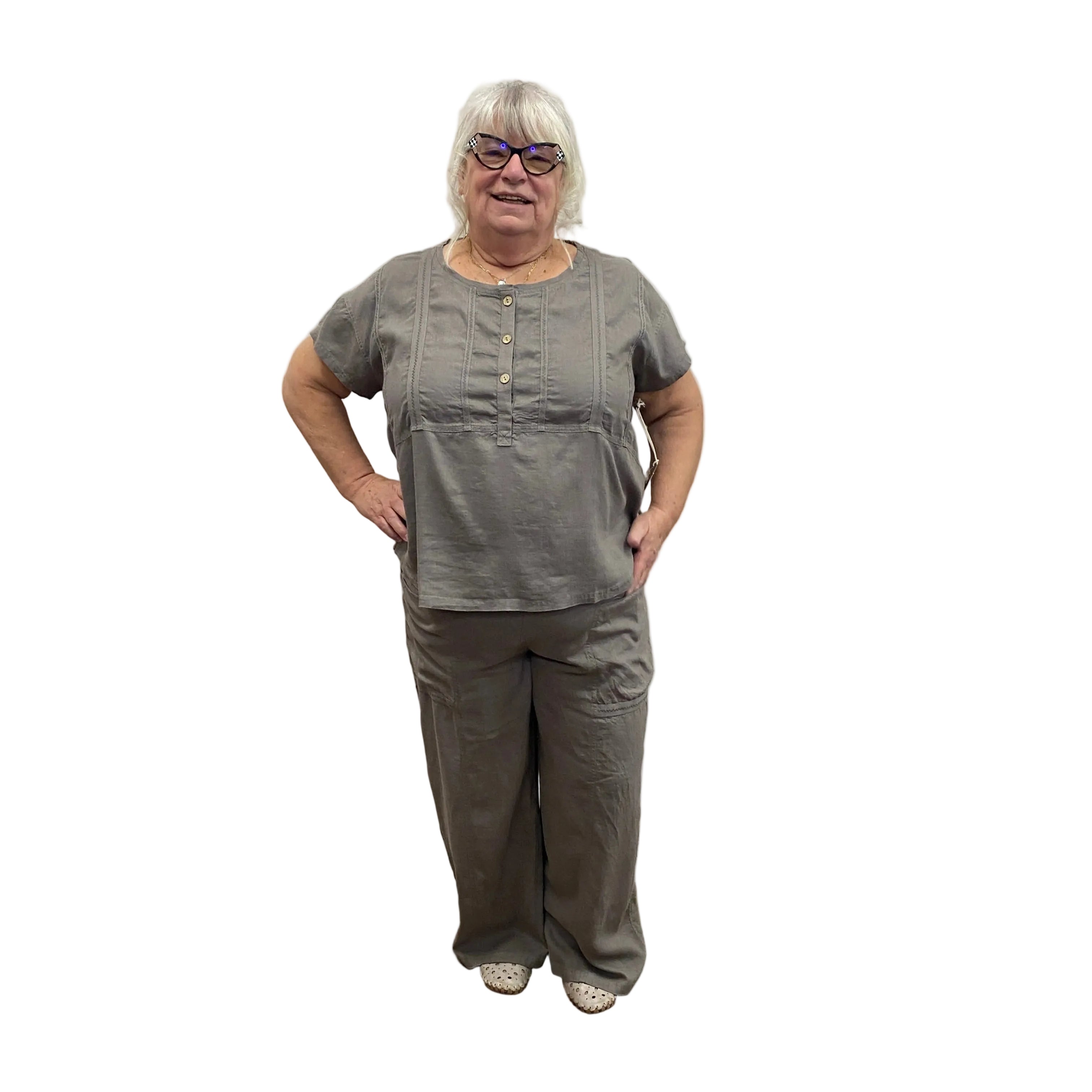 Person wearing a gray Papa Top and Flood Pants outfit on white background.