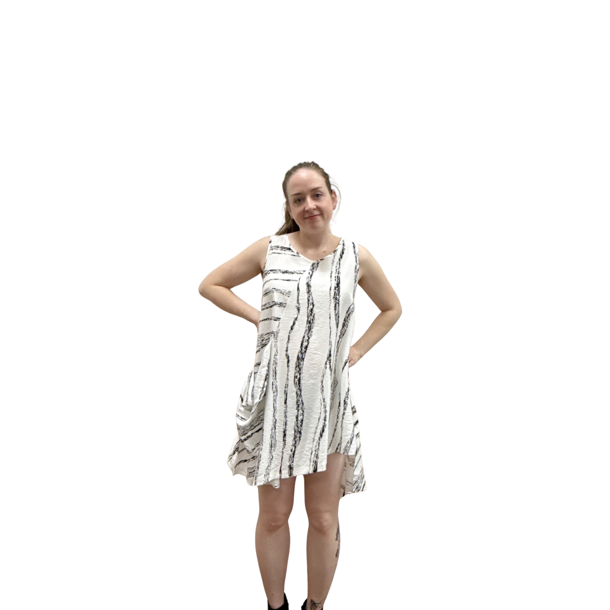 Woman wearing a sleeveless dress with a white background