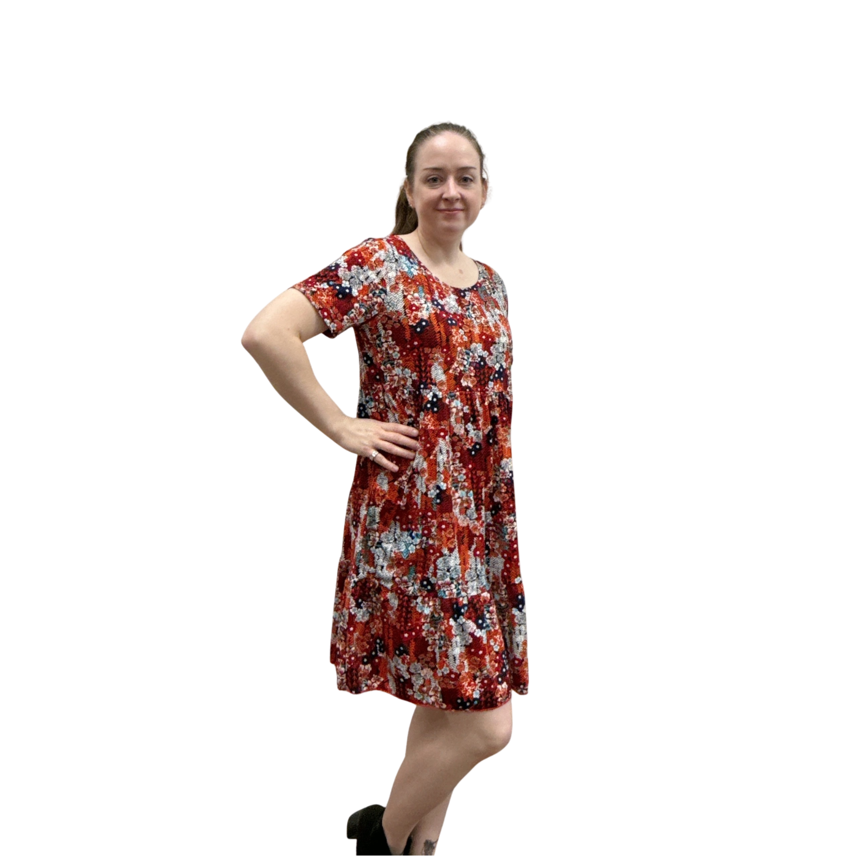 Woman wearing a floral dress on a white background