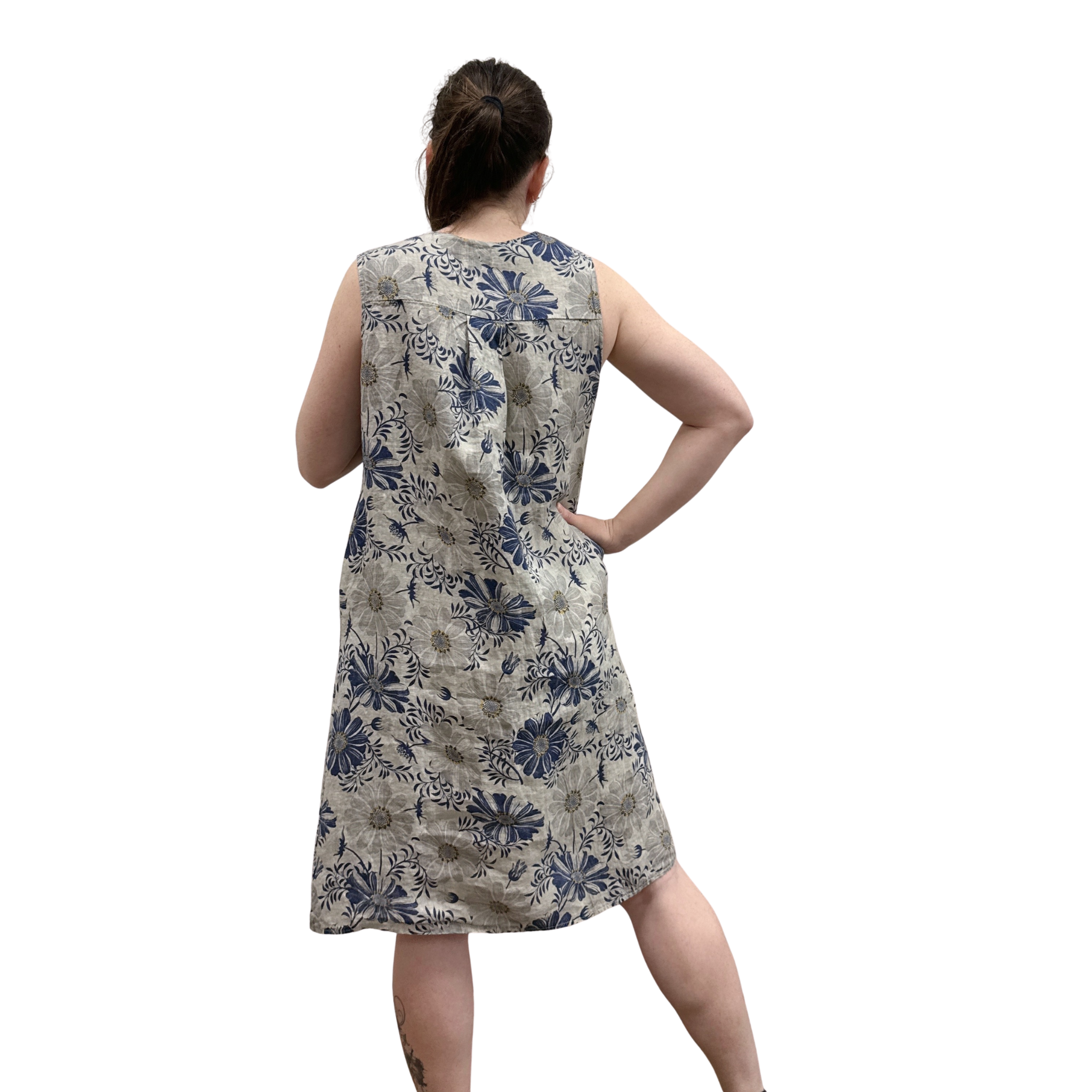 Woman wearing a floral dress on a white background