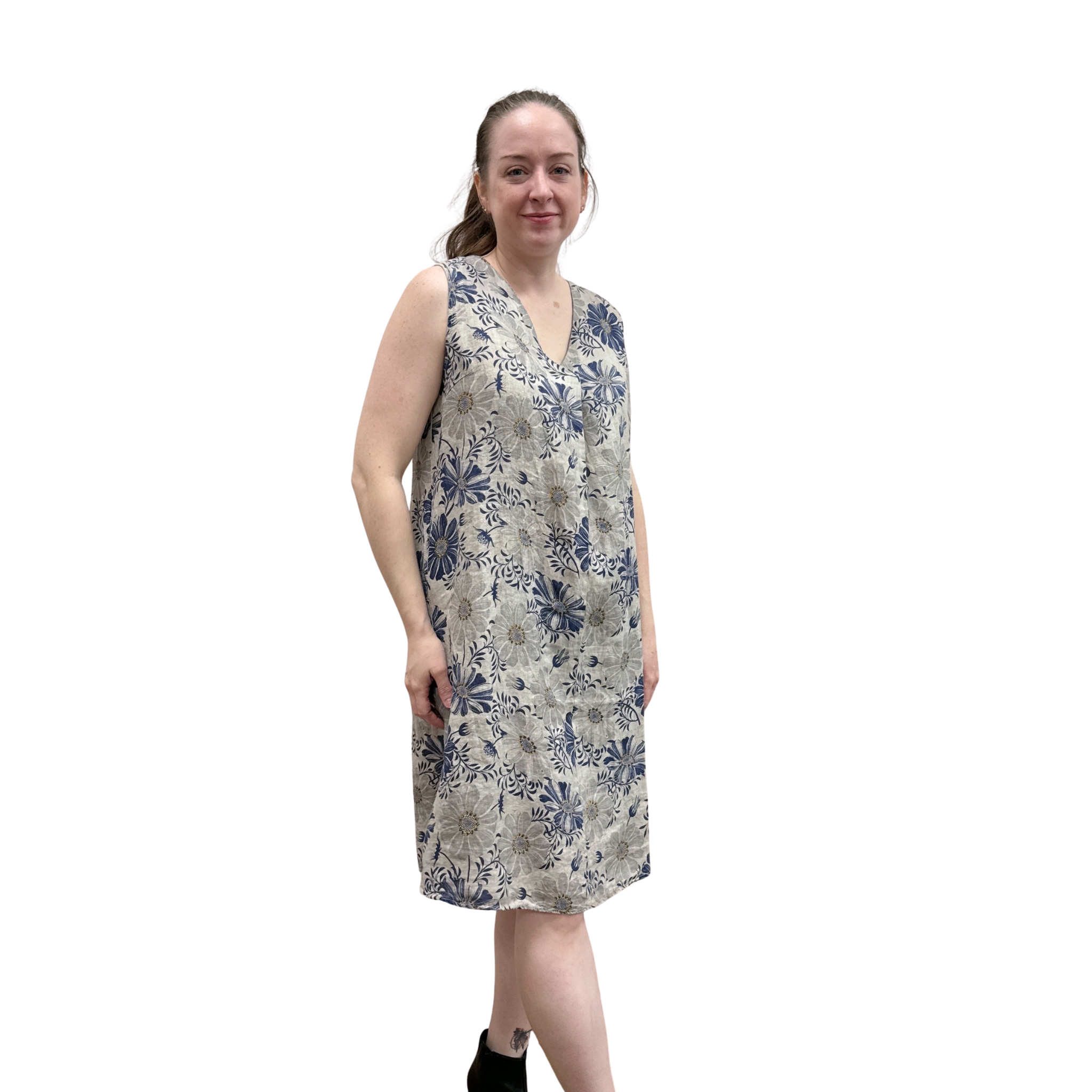 Woman wearing a floral dress on a white background