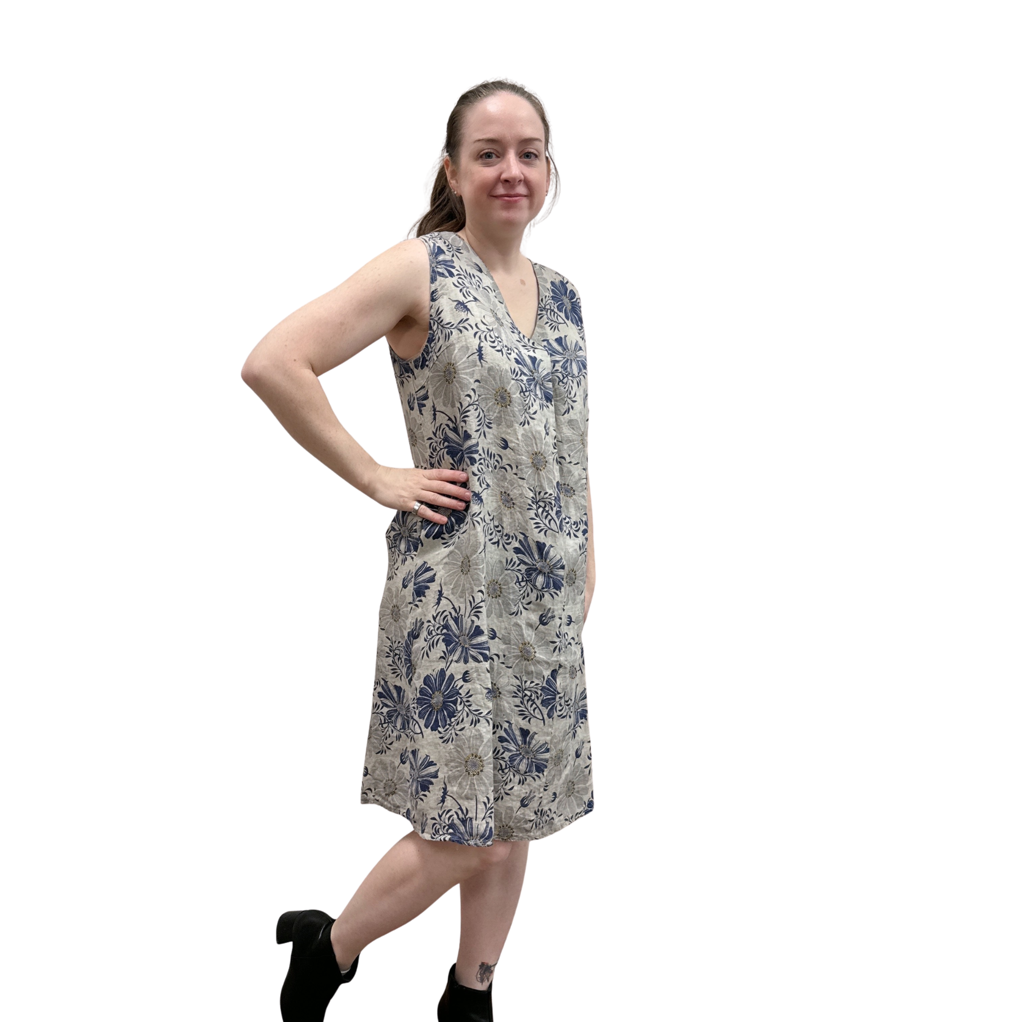 Woman wearing a floral dress on a white background