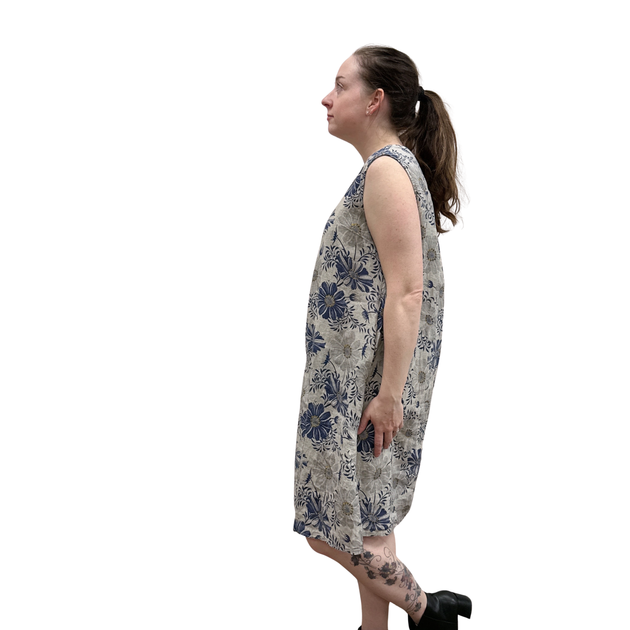 Woman wearing a floral dress on a white background