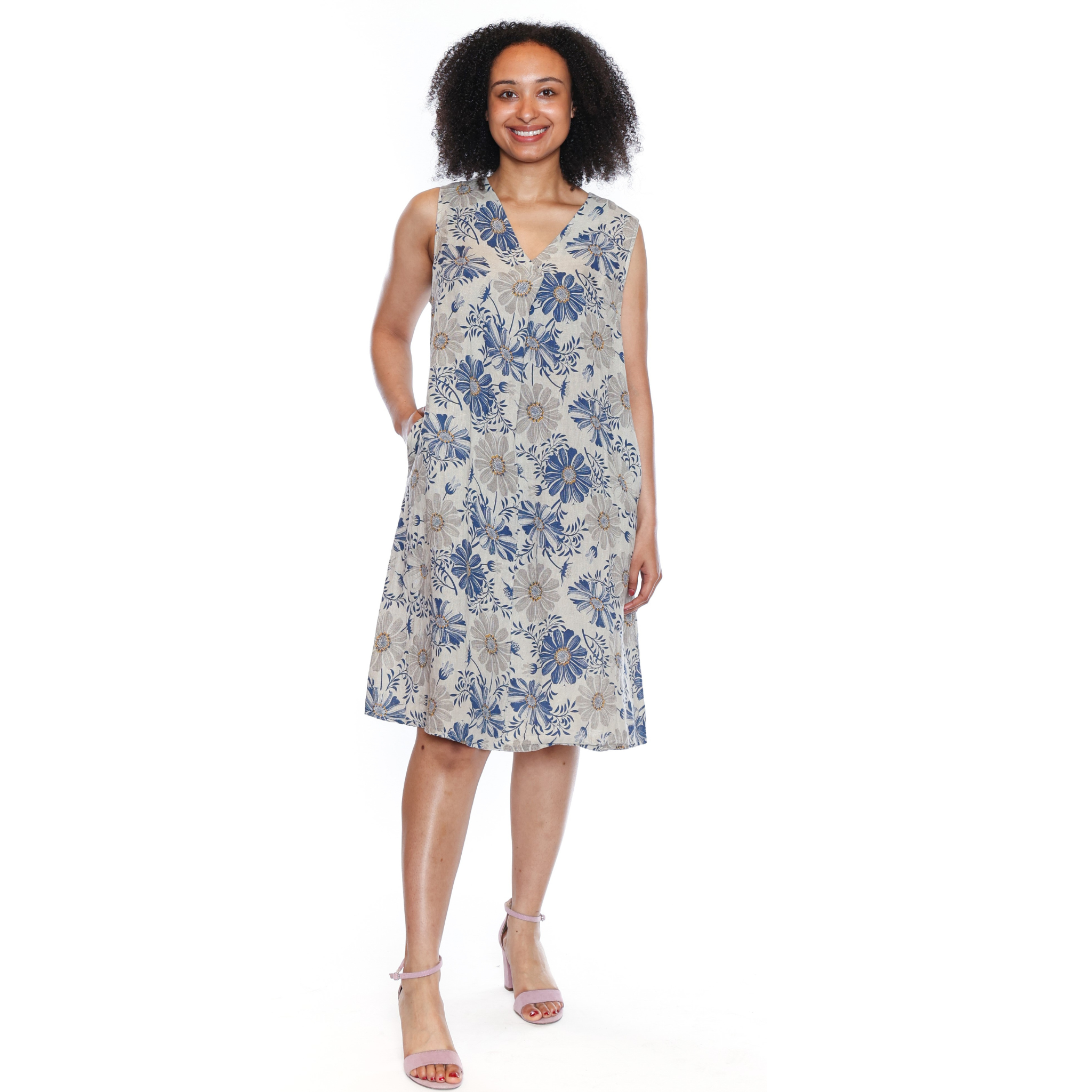 Woman wearing a floral dress on a white background