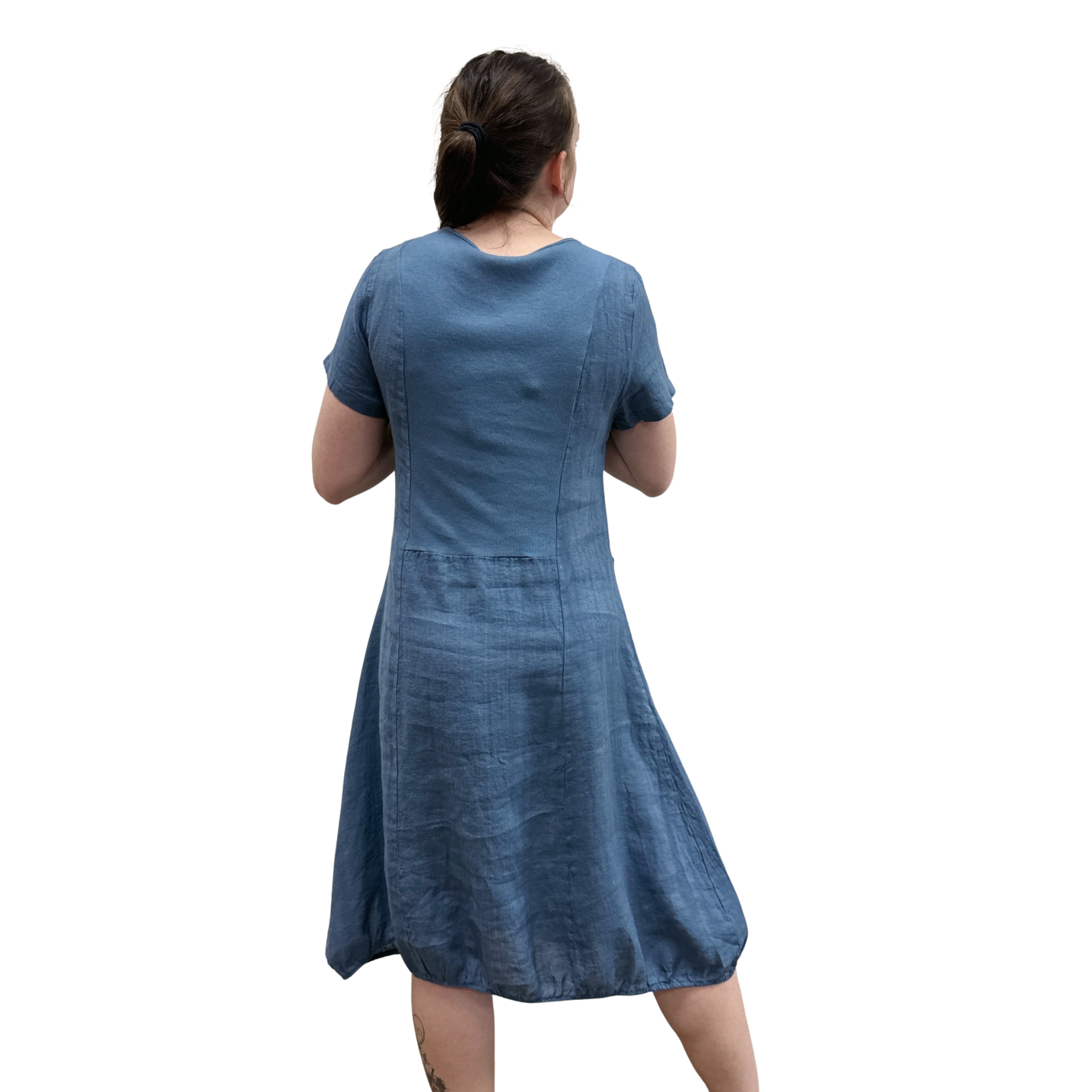 Woman wearing a blue dress on a white background