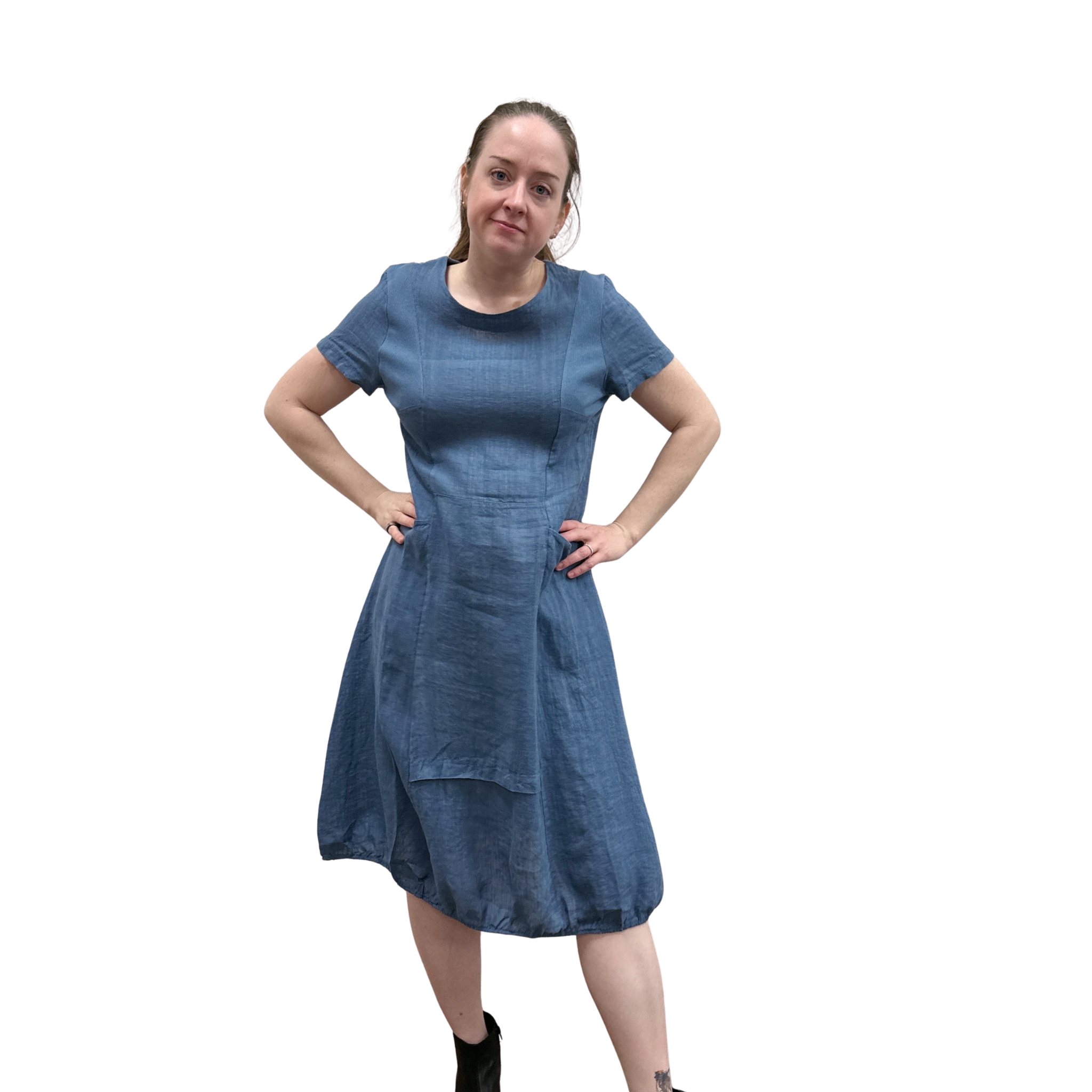 Woman wearing a blue dress on a white background