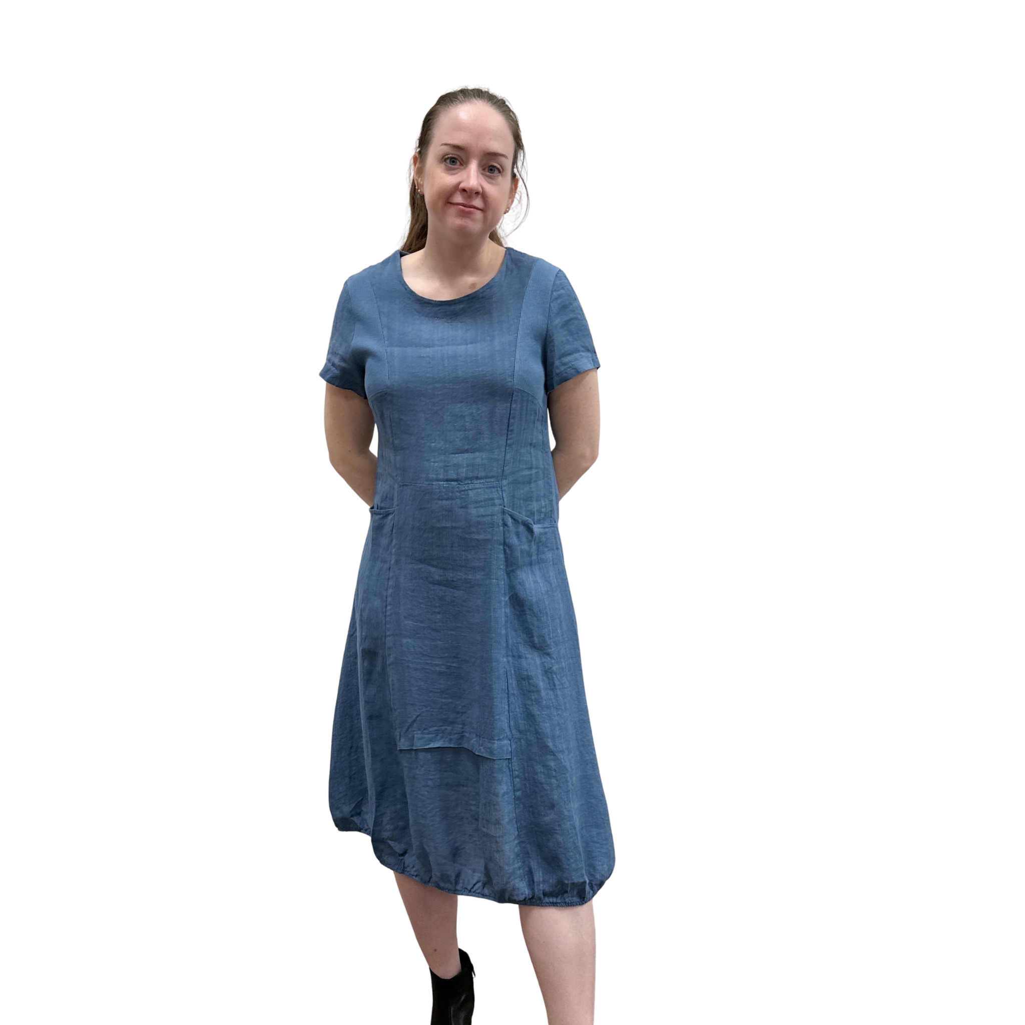 Woman wearing a blue dress on a white background