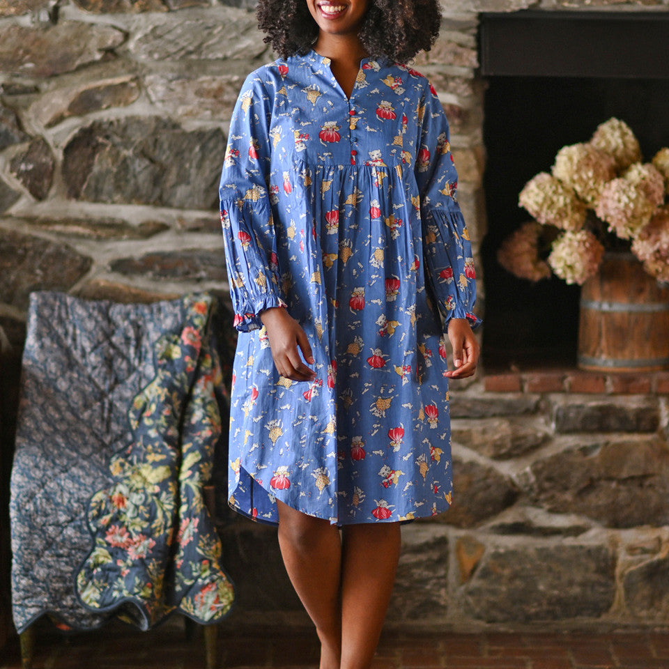 Woman wearing a blue nighty in a living room