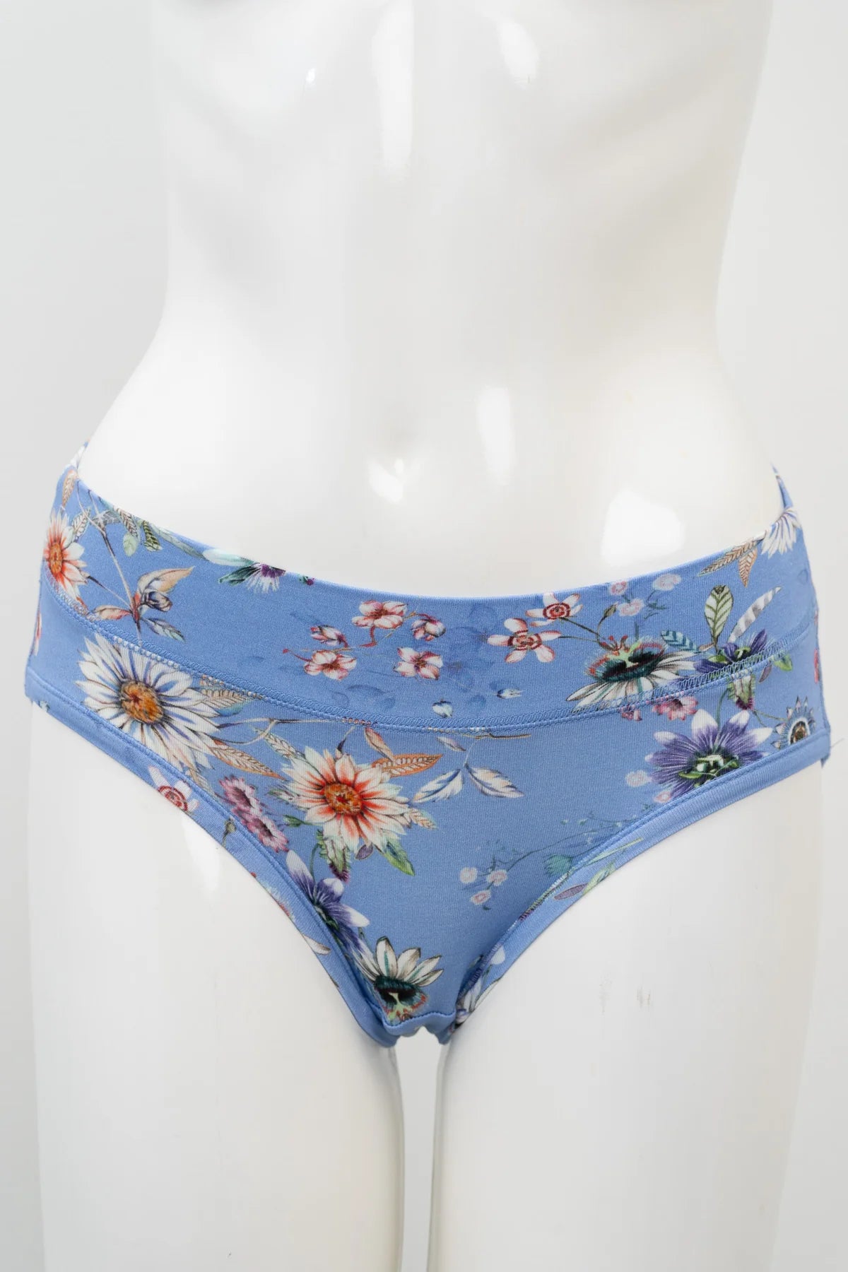 Blue floral-patterned underwear on a mannequin against a white background