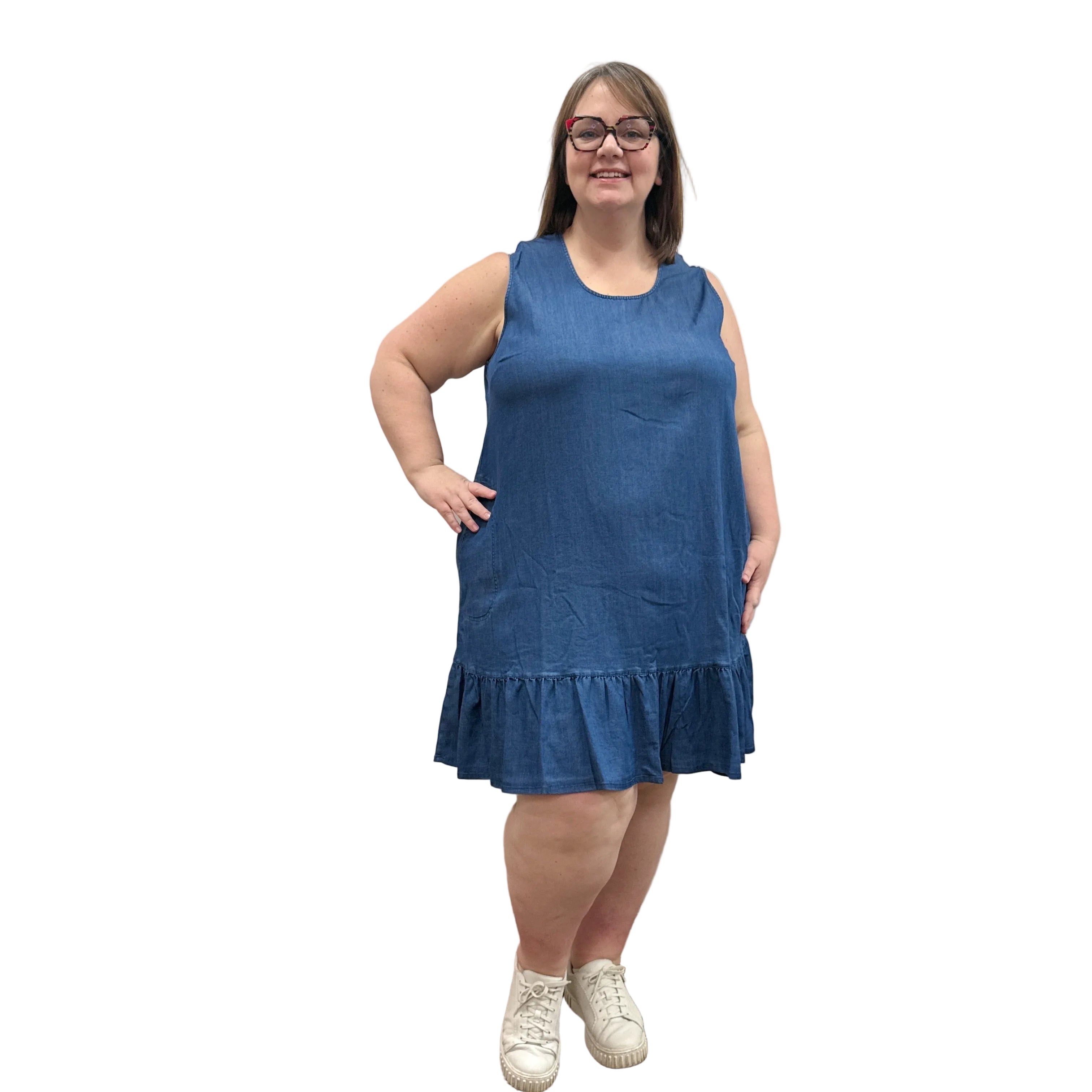 Woman wearing a Denim Blue Sky Lali Dress on white background.