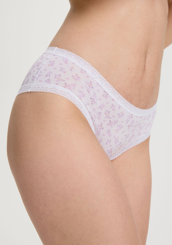 White lace underwear on a neutral background