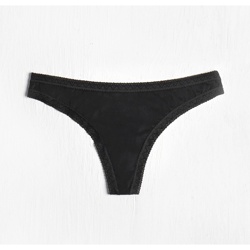 This image displays a sleek, black microfiber thong panty designed for everyday comfort. The thong features a delicate lace trim on the edges, a low-rise cut, and back shirring for a smooth finish.