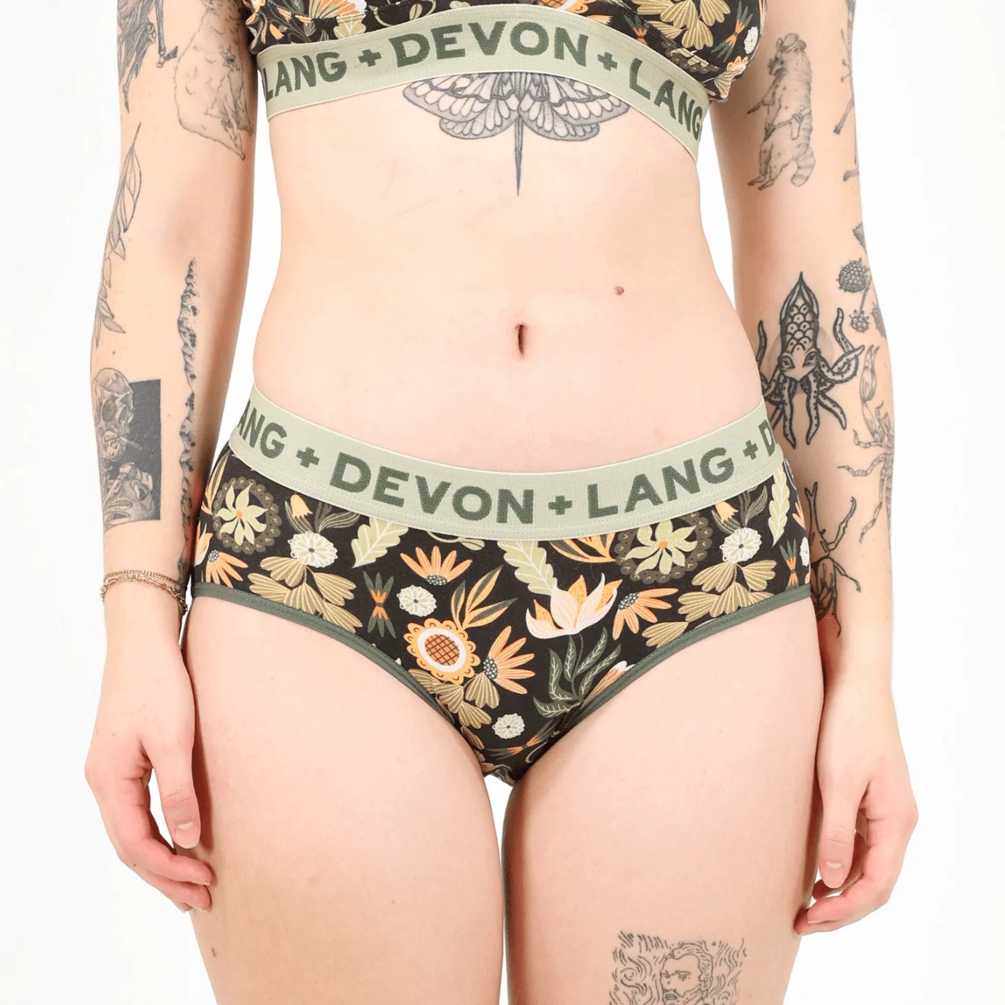 Floral underwear with 'Lang + Devon' branding on a plain background