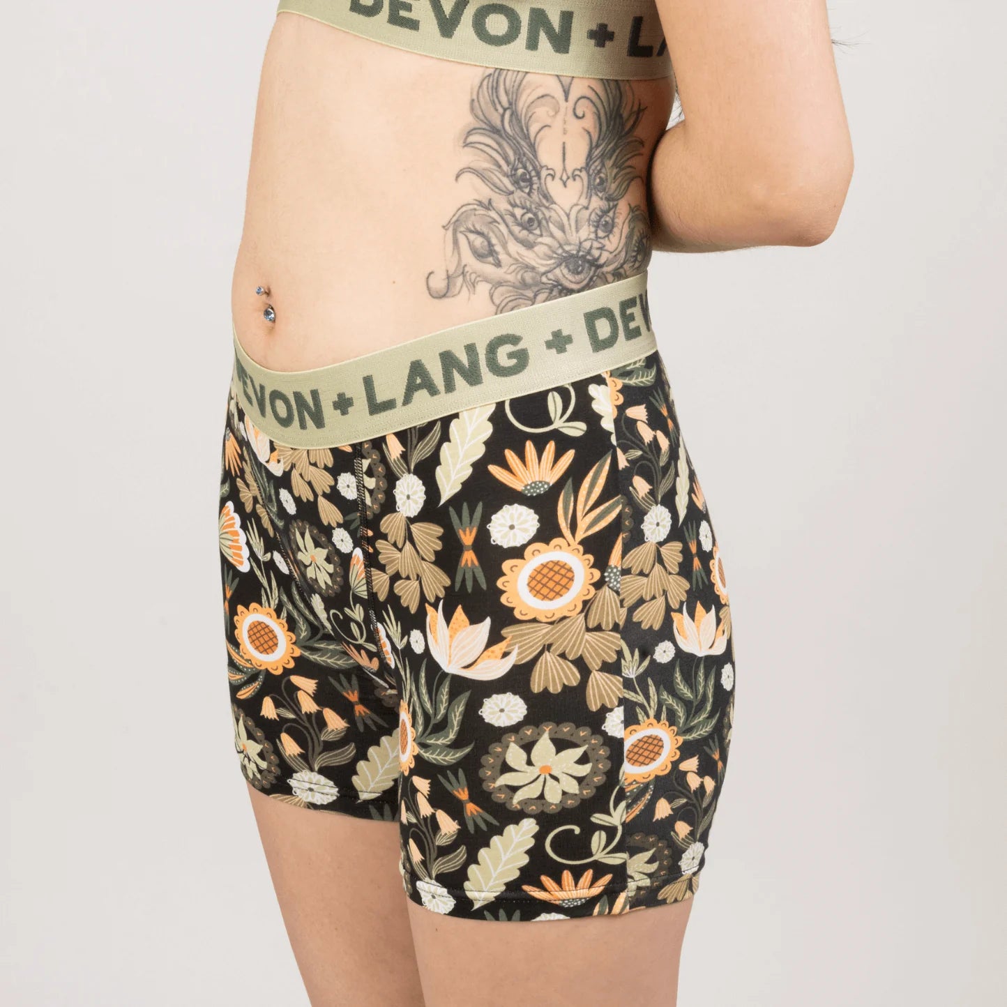 Floral patterned underwear with visible branding on a plain background
