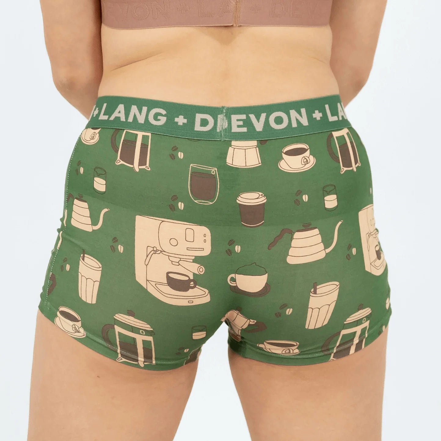 Green boxer briefs with coffee-themed pattern and 'Lang + Devon' waistband on a plain background