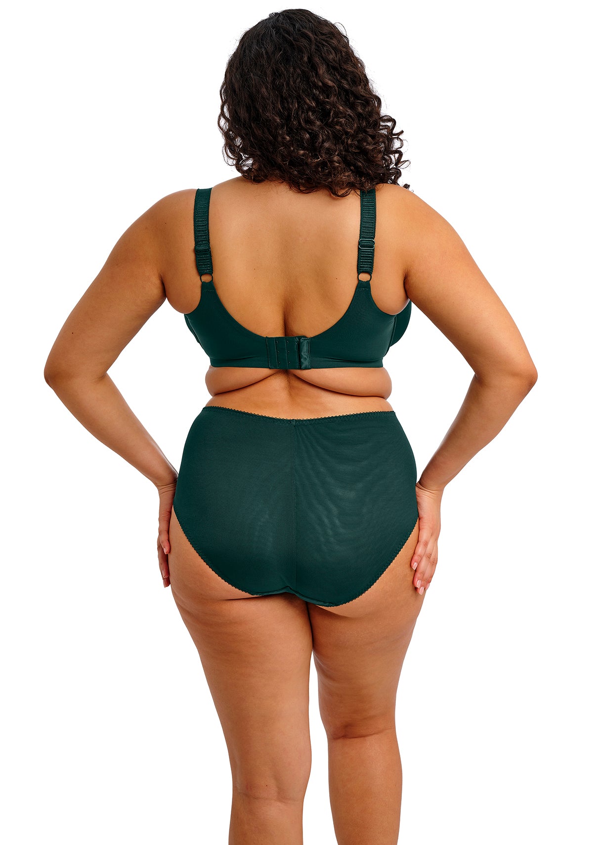 Person wearing a green swimsuit on a white background