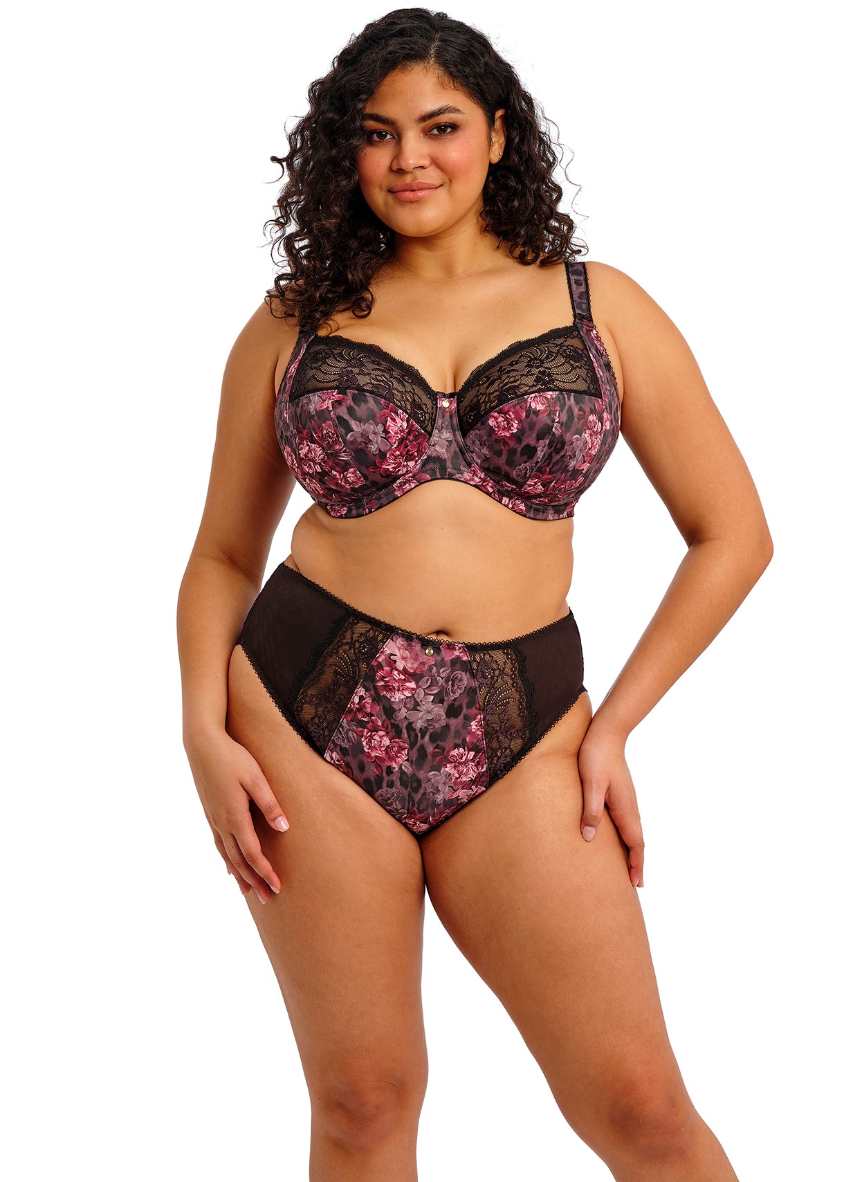 Woman wearing a floral lingerie set on a white background