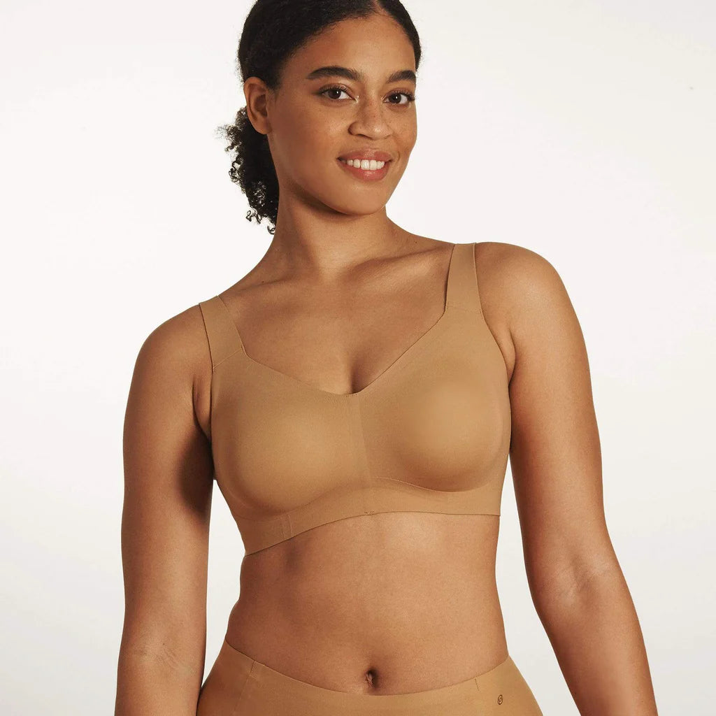 Beyond Bra in Mica, light tan wirefree bra shown on a model from the front view.