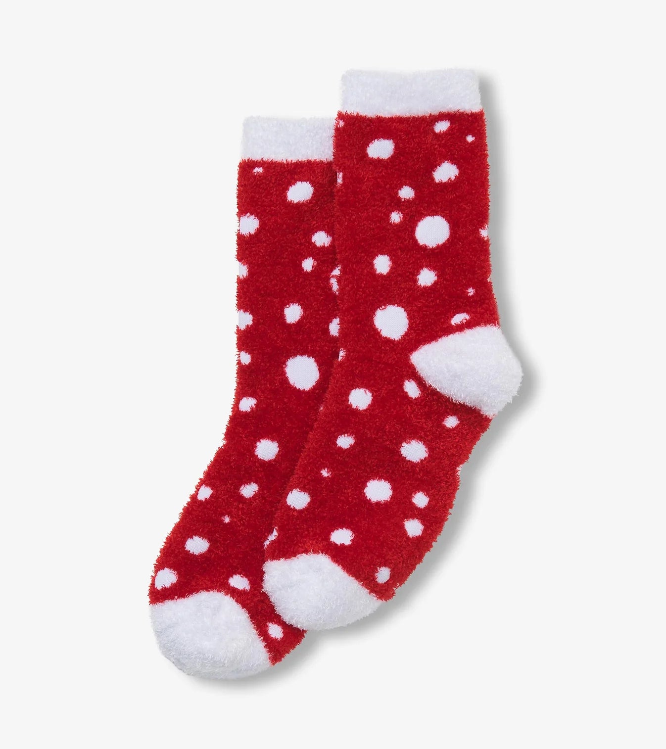 Red socks with white polka dots on a light gray background