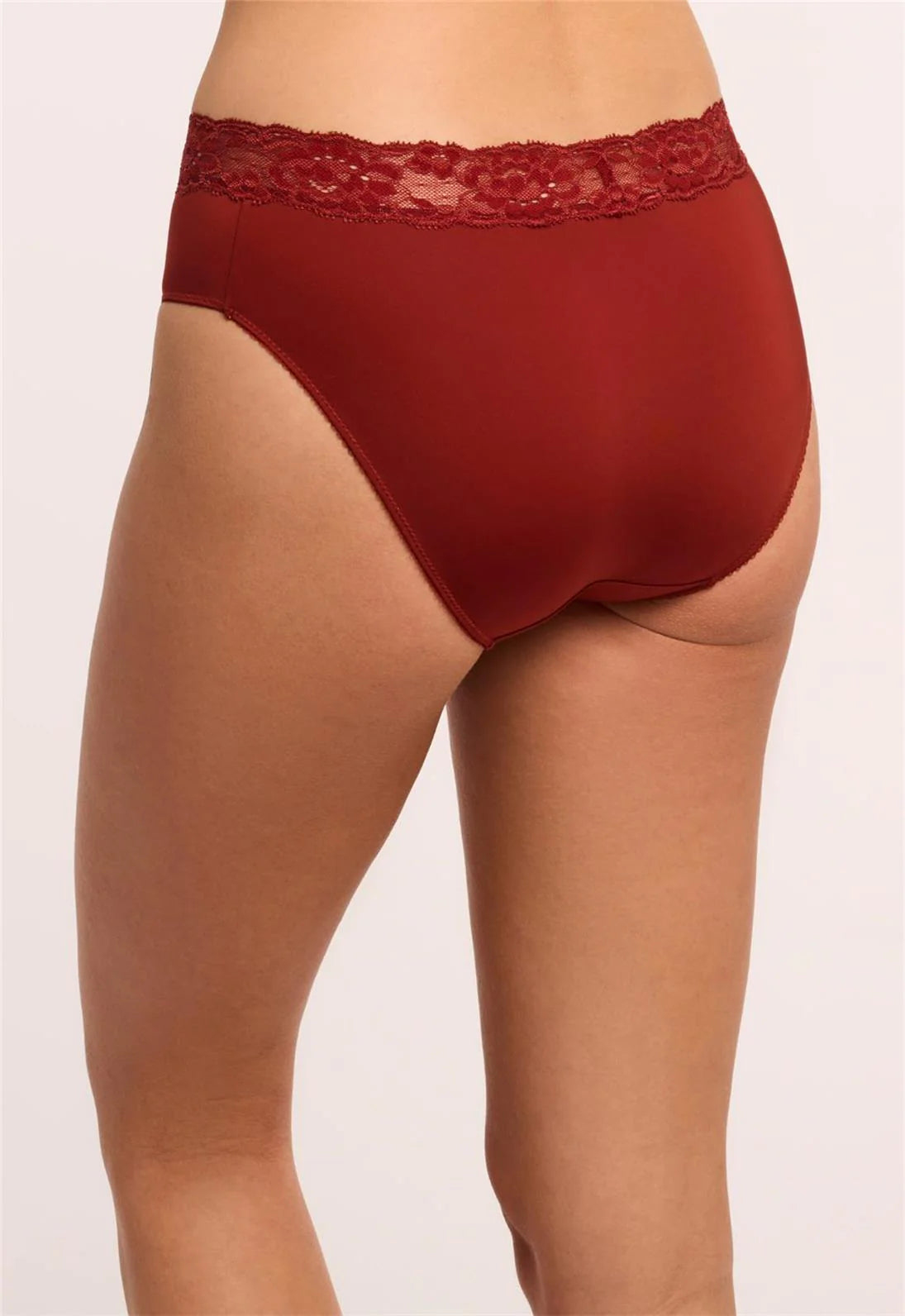 Red underwear with lace waistband on a plain background