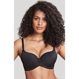 A woman wearing a black spacer bra with adjustable straps and powermesh wings.