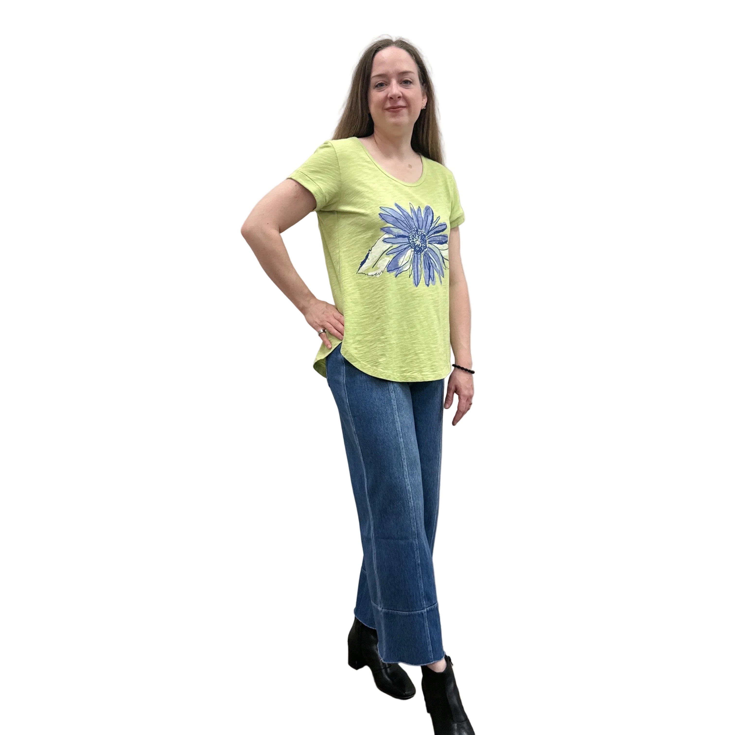 Person wearing a green Papa Cuffed Sleeve shirt and blue pants on white background.