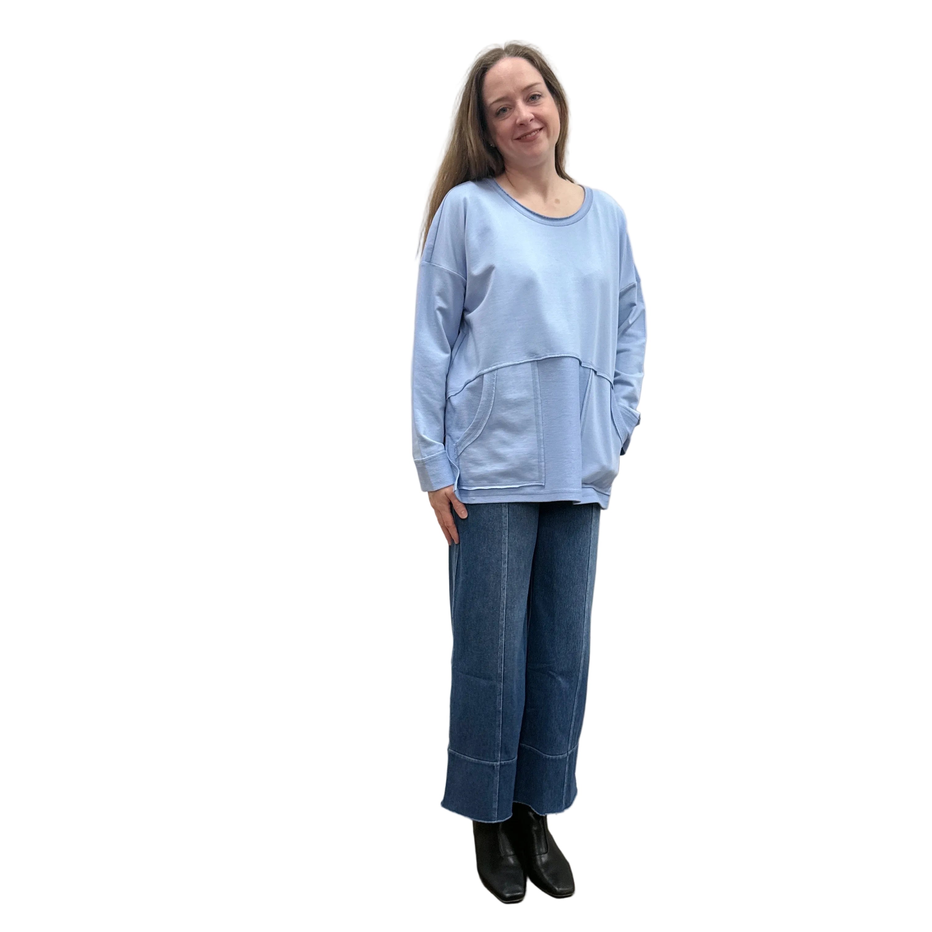 Person wearing a blue Papa Weekend Pullover sweater and jeans on white background.