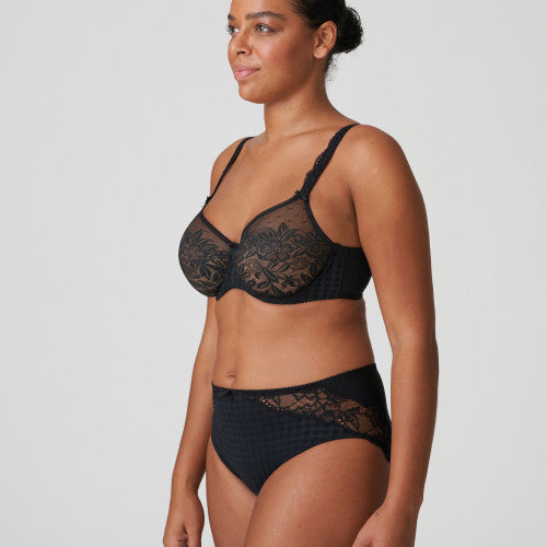 PrimaDonna Madison Seamless Bra in Black shown on a model against a white background, with a matching panty.