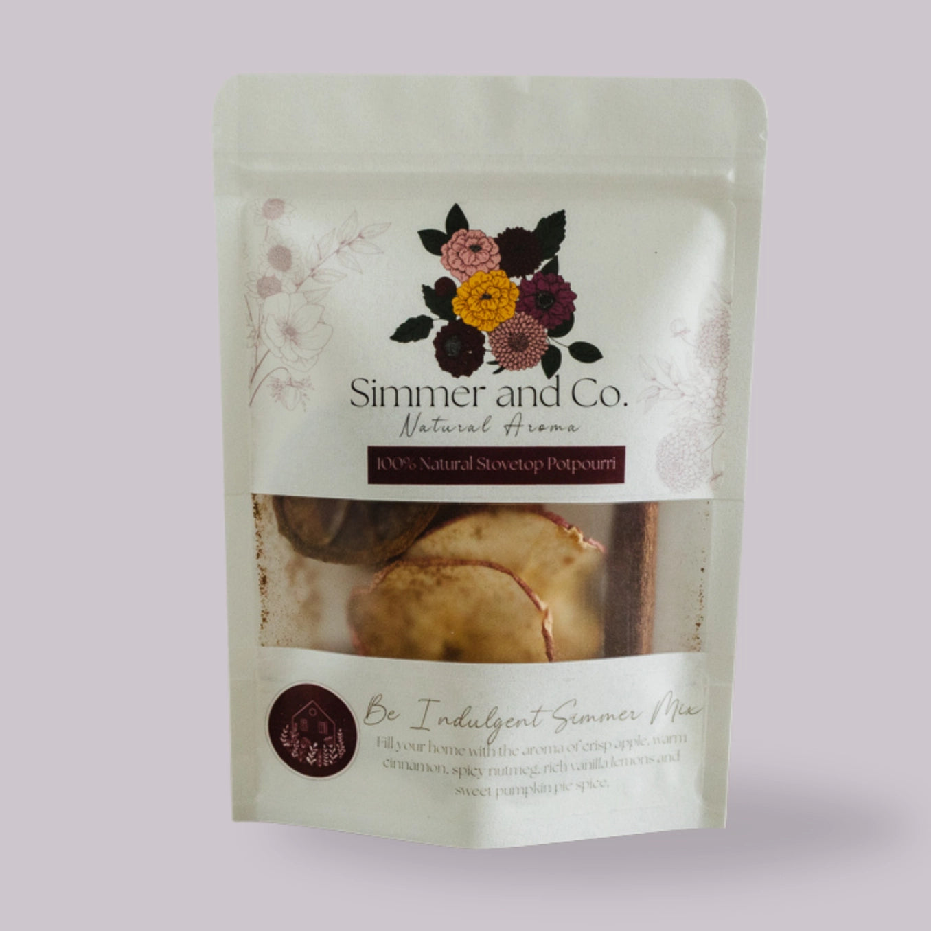 Simmer and Co. potpourri package with floral design on a light purple background