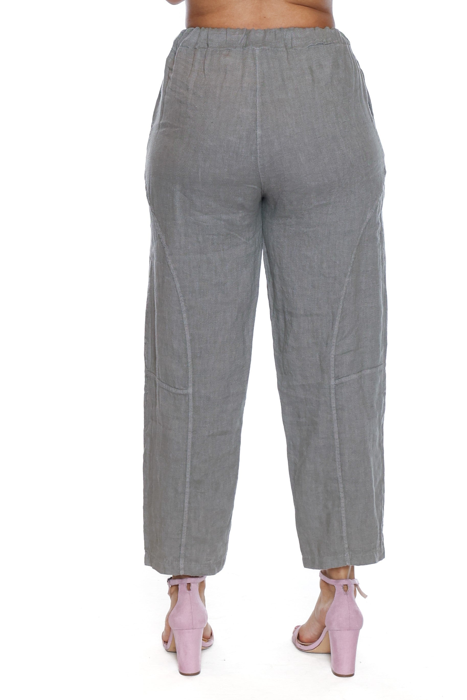 Sage green worn by a person standing backward on a white background