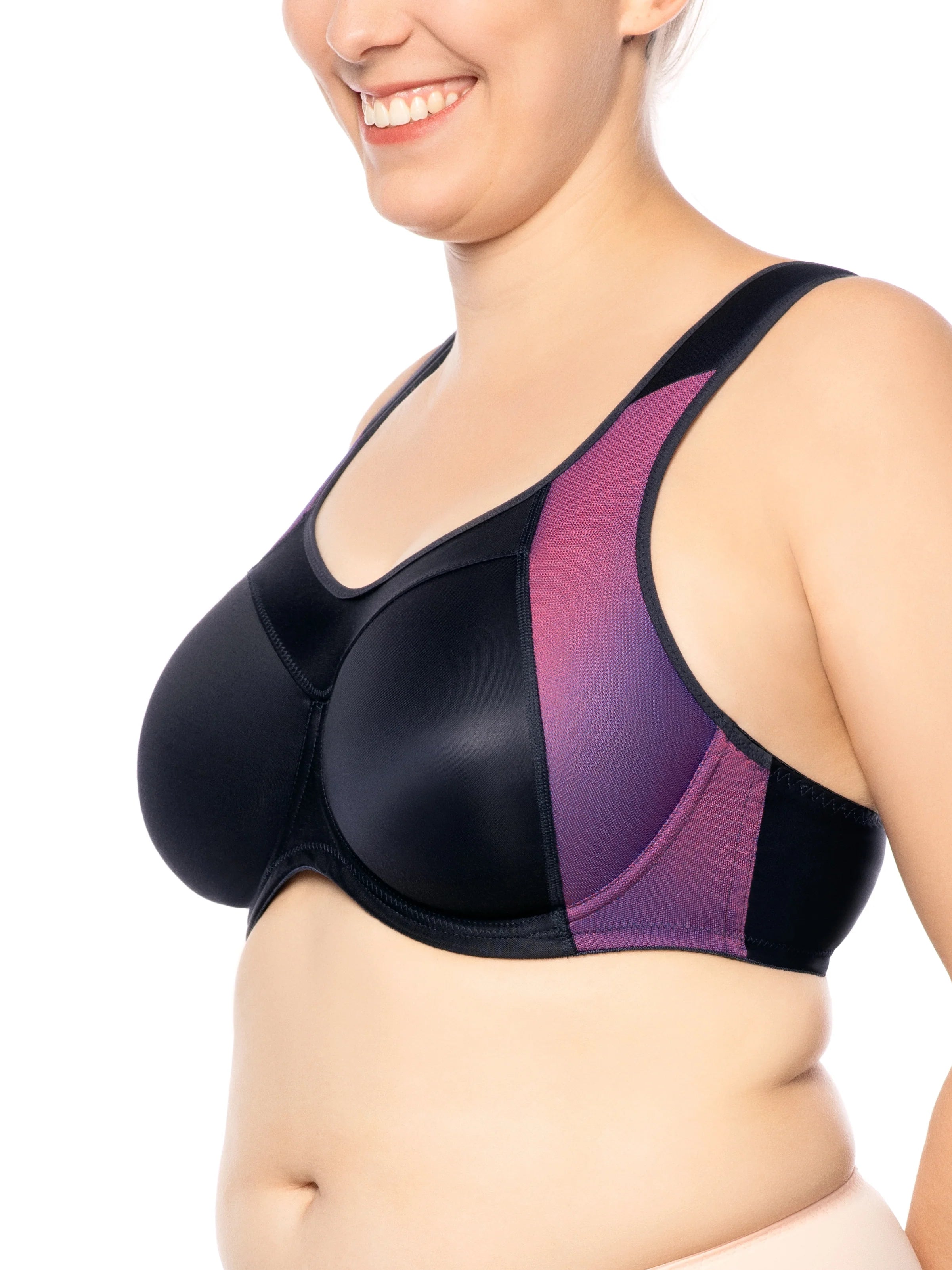 Black and purple sports bra worn by a person on a white background