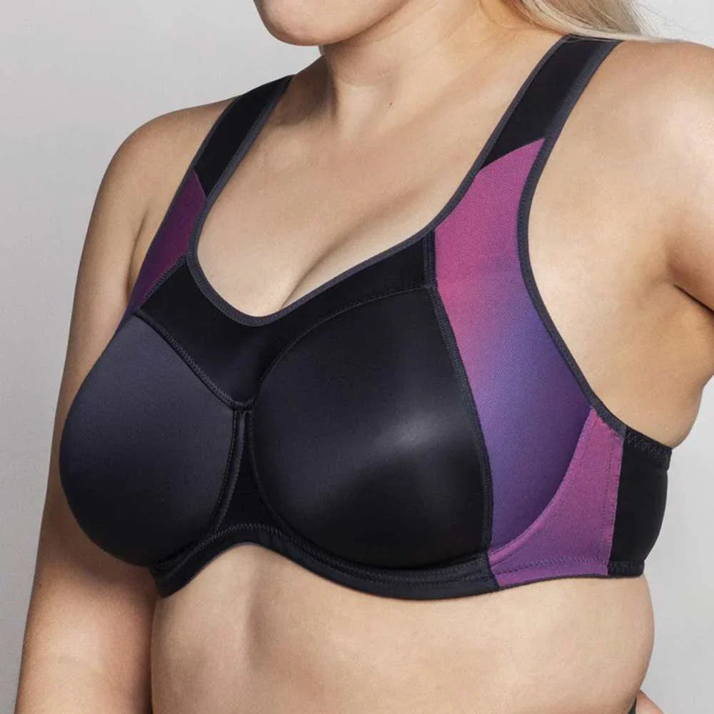 Black and purple sports bra on a plain background