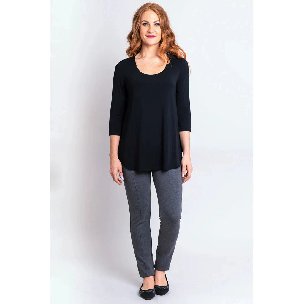 Blue Sky Jazz 3/4 Sleeve Top in Black shown on a model wearing grey leggings standing against a white background, from the front view.