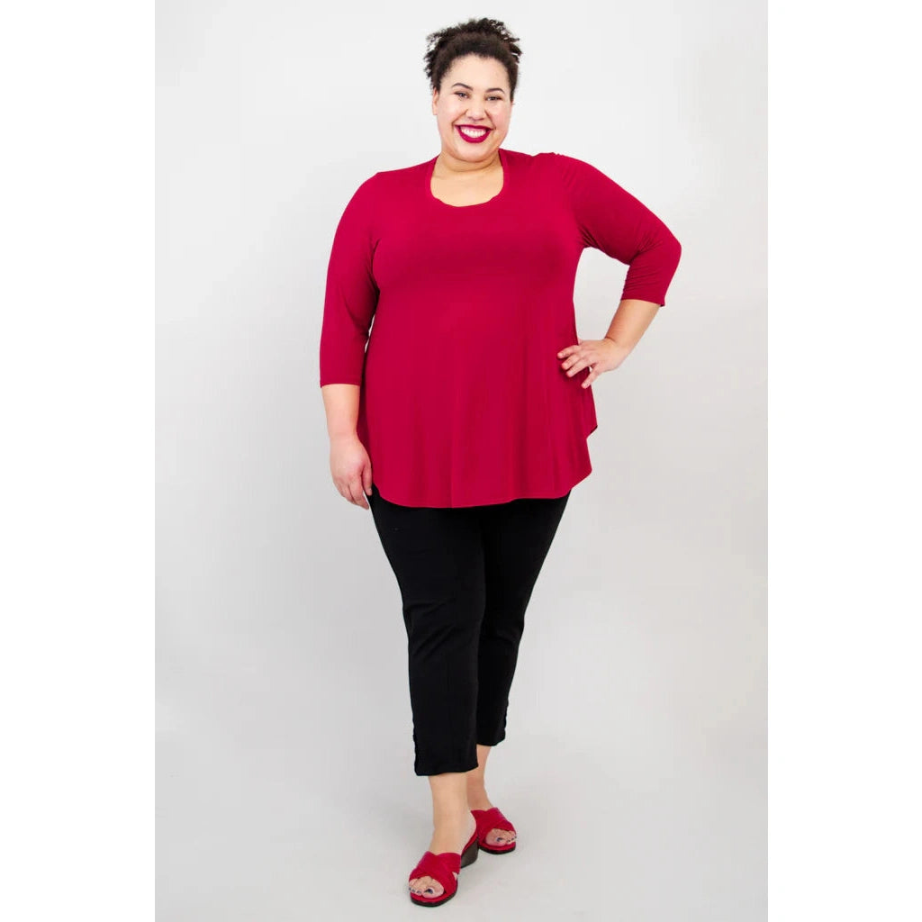 Blue Sky Jazz 3/4 Sleeve Top in Lipstick Red shown on a model wearing black leggings against a white background, from the front view.