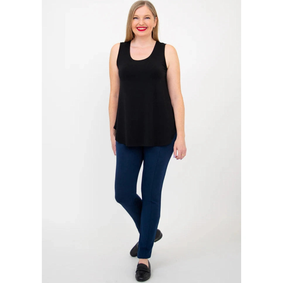Blue Sky Jazz Tank in Black shown on a model wearing blue leggings standing against a white background, from the front view.