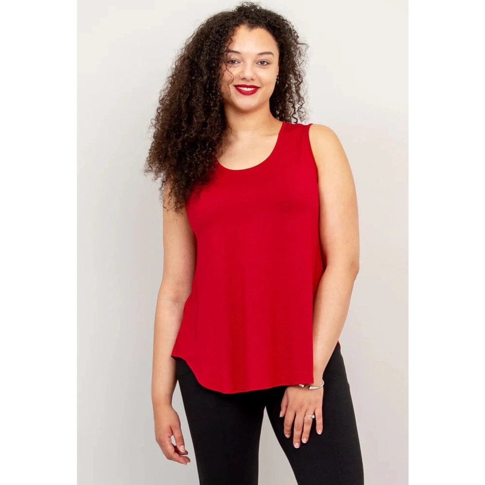 Blue Sky Jazz Tank in Lipstick Red shown on a model wearing black leggings against a white background, from the front view.