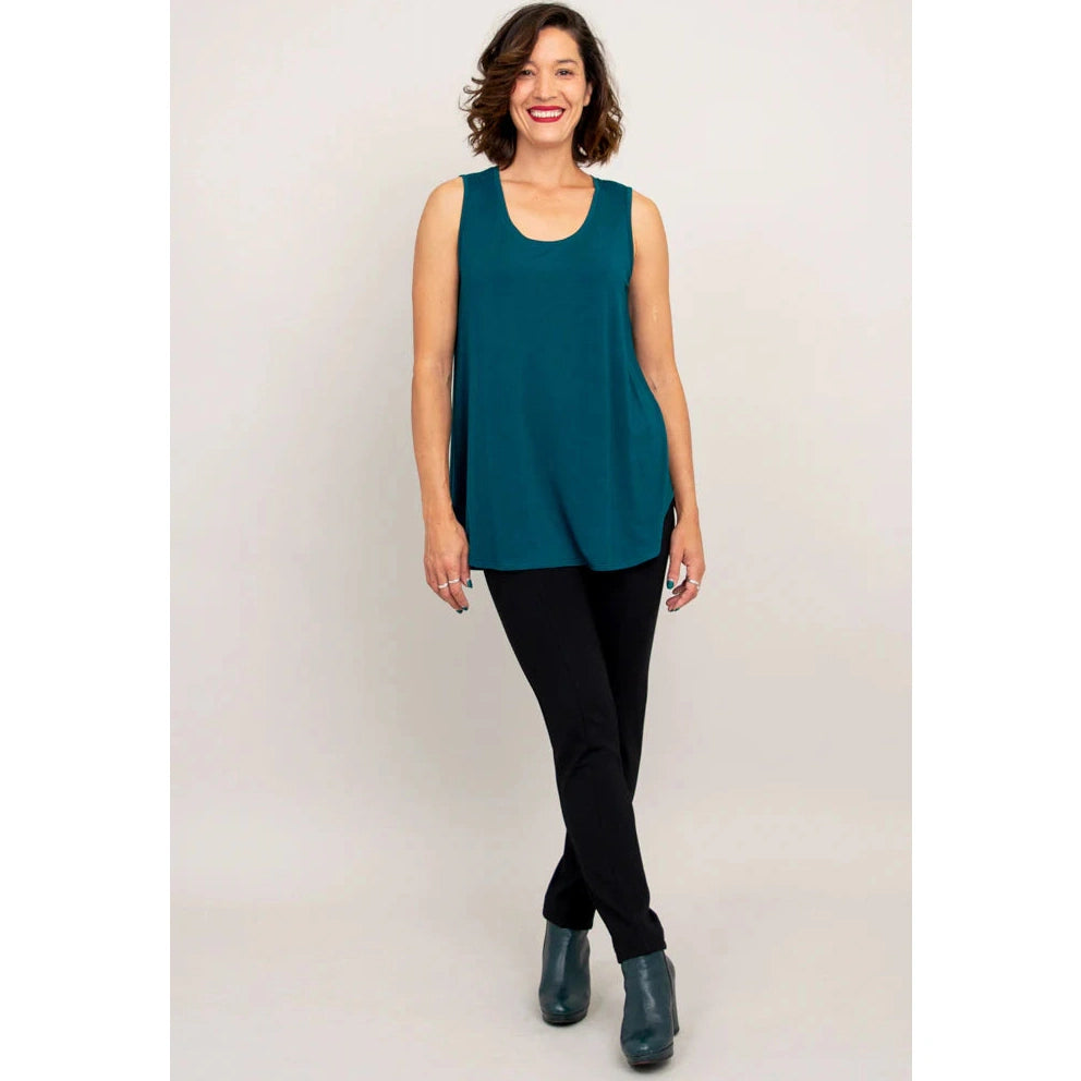 Blue Sky Jazz Tank in Teal shown on a model wearing black leggings against a white background, from the front view.