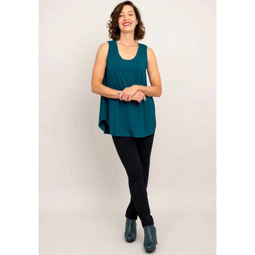Blue Sky Jazz Tank in Teal shown on a model wearing black leggings against a white background, from the front view.