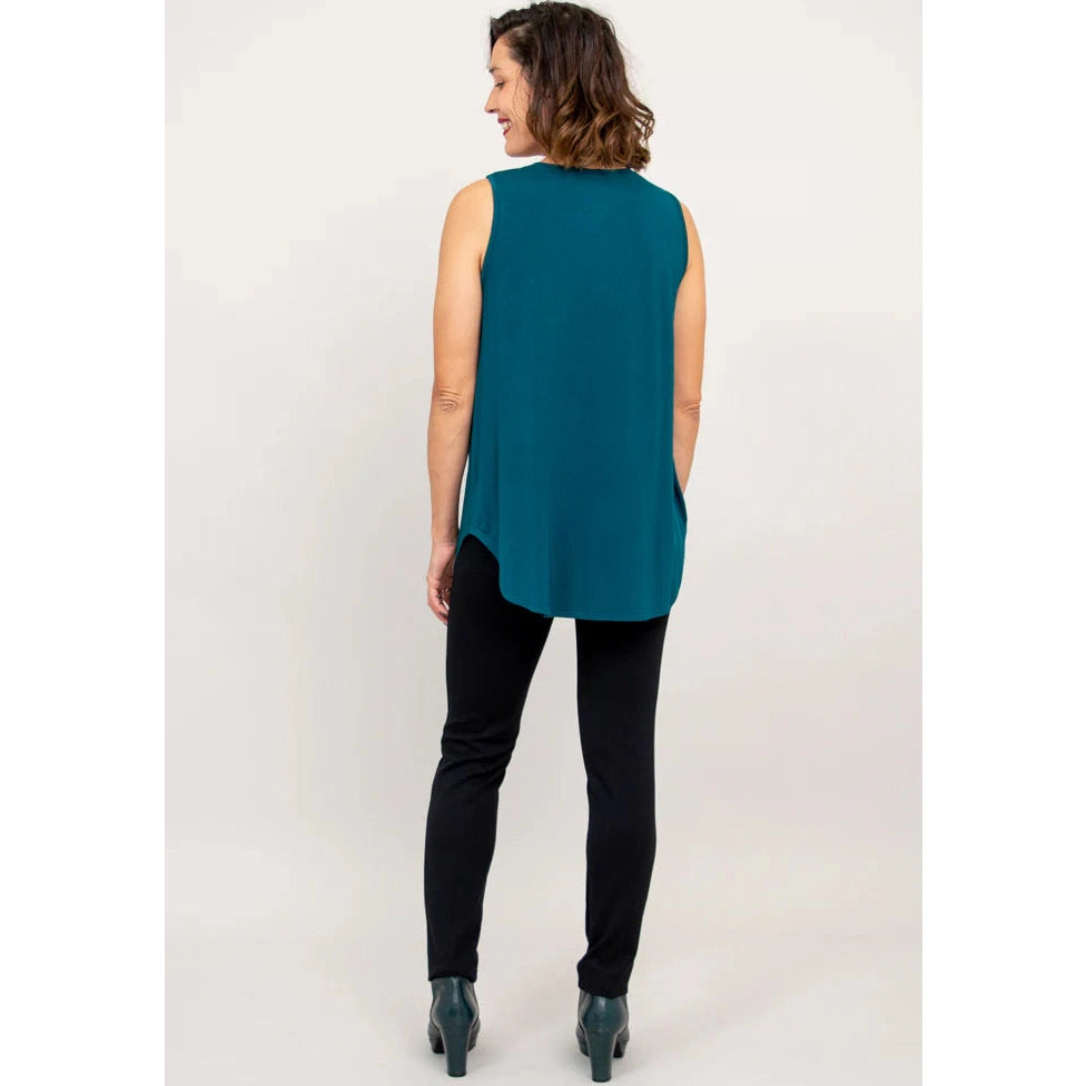 Blue Sky Jazz Tank in Teal shown on a model wearing black leggings against a white background, from the back view.