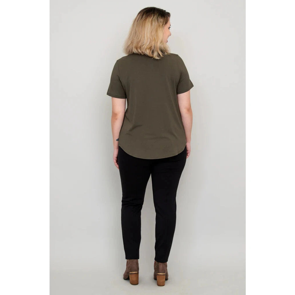 Blue Sky Tessa Tee in Khaki shown on a model wearing black leggings against a white background, from the back view.