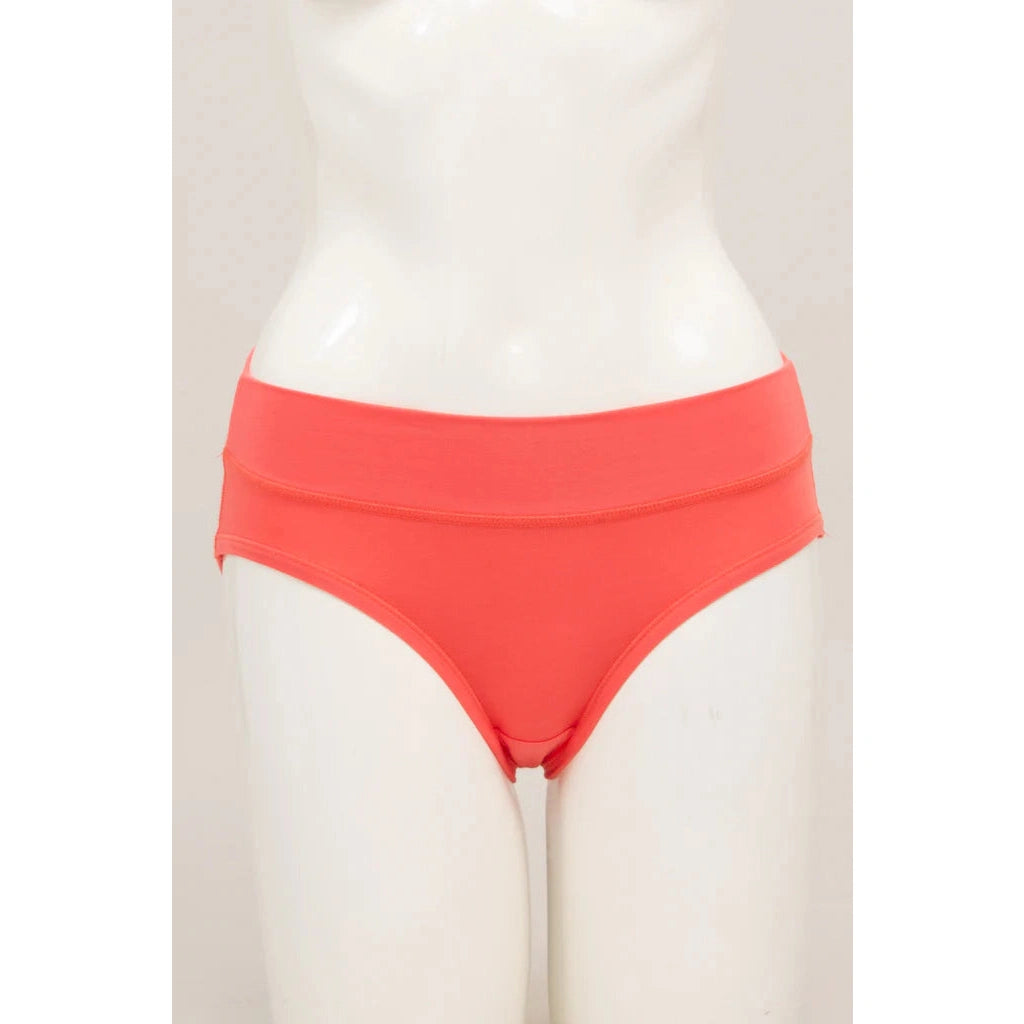 Blue Sky The Hipster Panty in Coral orange shown on a mannequin against a white background, from the front view.