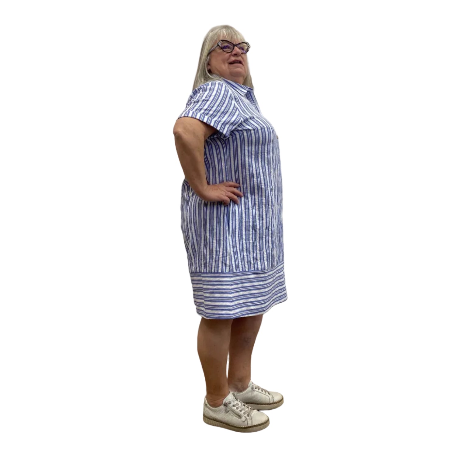 Woman wearing the Escape Marina Shirt Dress with blue and white stripes against a white background.